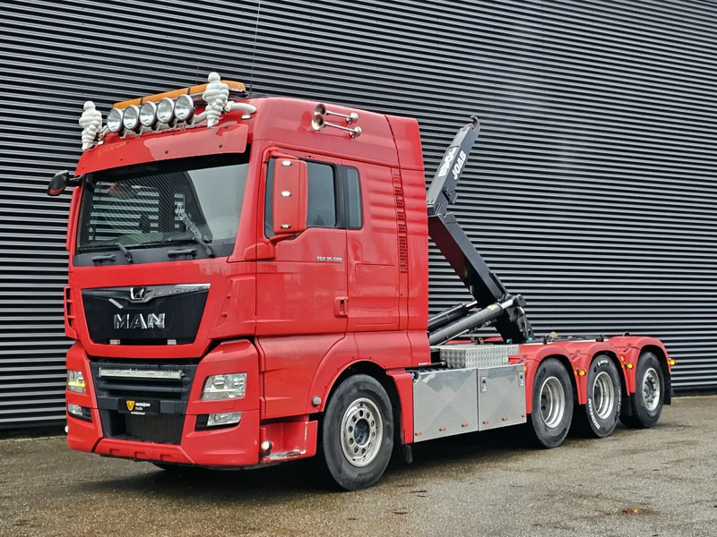 MAN TGX 35.500 / 8x4-4 / ABROLL-KIPPER / HOOKLIFT - Koukkulava kuorma-auto: kuva MAN TGX 35.500 / 8x4-4 / ABROLL-KIPPER / HOOKLIFT - Koukkulava kuorma-auto MAN TGX 35.500 / 8x4-4 / ABROLL-KIPPER / HOOKLIFT - Koukkulava kuorma-auto: kuva MAN TGX 35.500 / 8x4-4 / ABROLL-KIPPER / HOOKLIFT - Koukkulava kuorma-auto