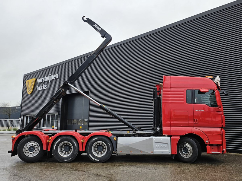 MAN TGX 35.500 / 8x4-4 / ABROLL-KIPPER / HOOKLIFT - Koukkulava kuorma-auto: kuva MAN TGX 35.500 / 8x4-4 / ABROLL-KIPPER / HOOKLIFT - Koukkulava kuorma-auto MAN TGX 35.500 / 8x4-4 / ABROLL-KIPPER / HOOKLIFT - Koukkulava kuorma-auto: kuva MAN TGX 35.500 / 8x4-4 / ABROLL-KIPPER / HOOKLIFT - Koukkulava kuorma-auto