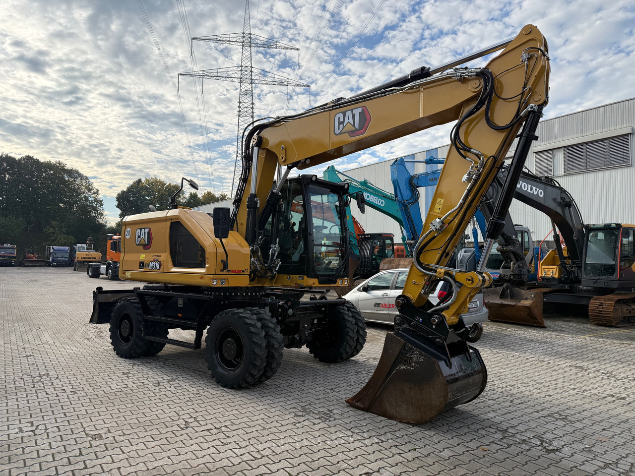 CATERPILLAR M318 NEW GEN Mobilbagger OQ65 ZS - Kaivuri: kuva CATERPILLAR M318 NEW GEN Mobilbagger OQ65 ZS - Kaivuri CATERPILLAR M318 NEW GEN Mobilbagger OQ65 ZS - Kaivuri: kuva CATERPILLAR M318 NEW GEN Mobilbagger OQ65 ZS - Kaivuri