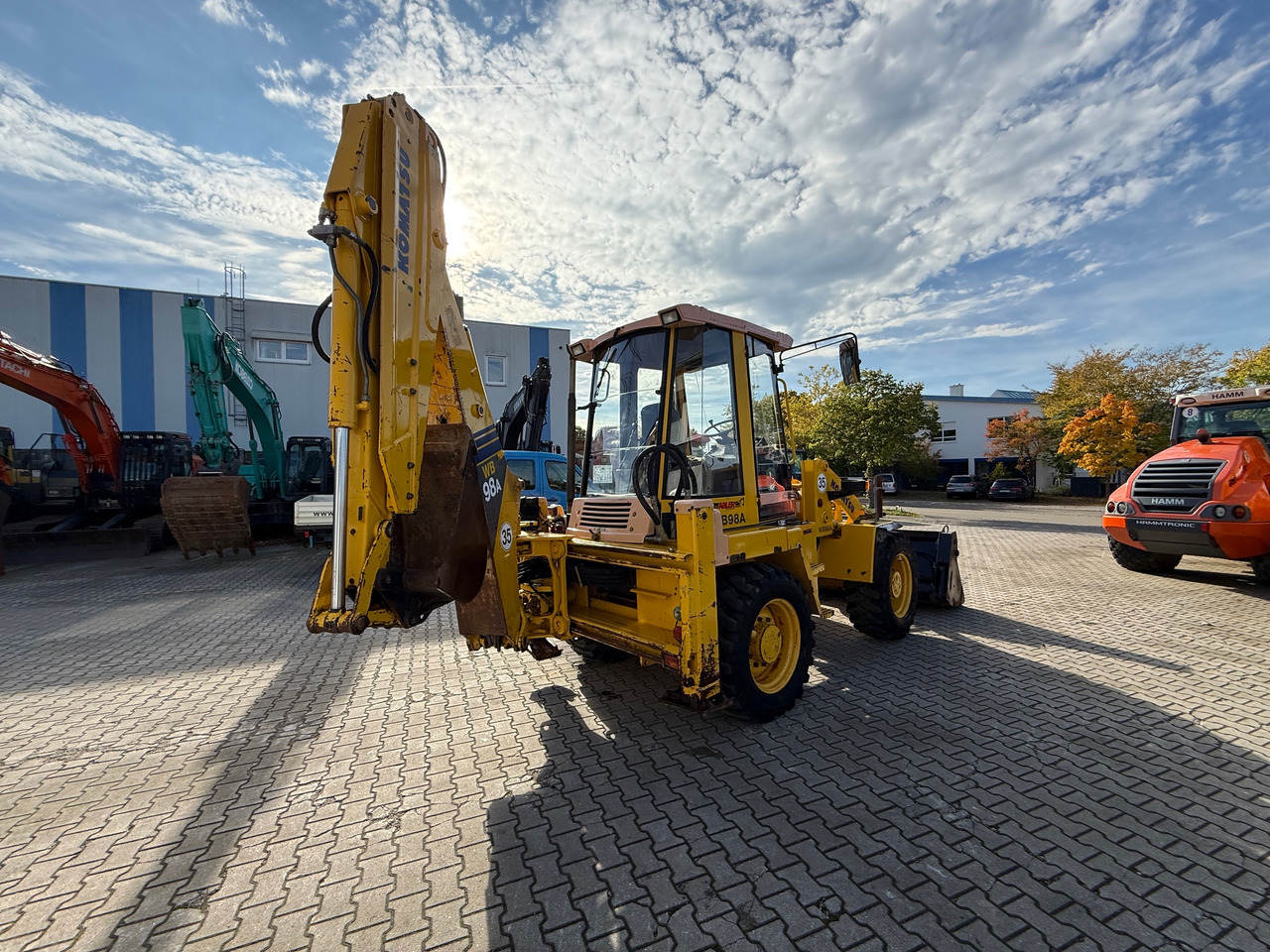 Komatsu WB98A-2 Baggerlader SW - Kaivuri-trukki: kuva  Komatsu WB98A-2 Baggerlader SW - Kaivuri-trukki Komatsu WB98A-2 Baggerlader SW - Kaivuri-trukki: kuva  Komatsu WB98A-2 Baggerlader SW - Kaivuri-trukki