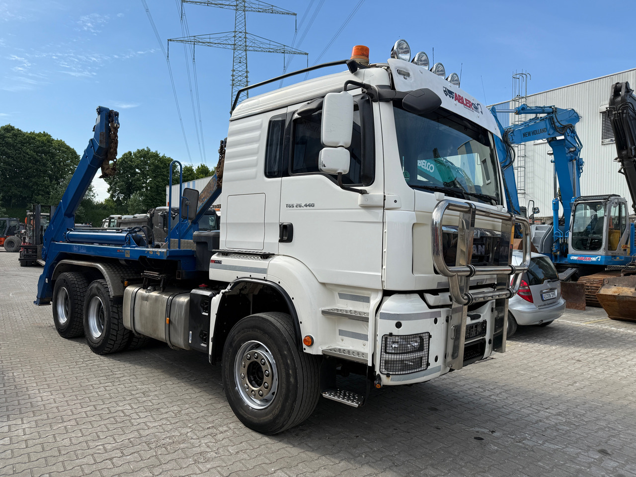 MAN TGS 26.440 WECHSELSYSTEM Absetzer+SZM - Nostovarsi-vaihtolavakuorma kuorma-auto: kuva MAN TGS 26.440 WECHSELSYSTEM Absetzer+SZM - Nostovarsi-vaihtolavakuorma kuorma-auto MAN TGS 26.440 WECHSELSYSTEM Absetzer+SZM - Nostovarsi-vaihtolavakuorma kuorma-auto: kuva MAN TGS 26.440 WECHSELSYSTEM Absetzer+SZM - Nostovarsi-vaihtolavakuorma kuorma-auto