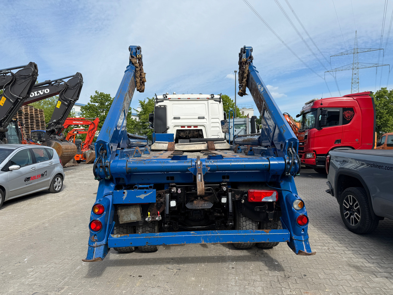 MAN TGS 26.440 WECHSELSYSTEM Absetzer+SZM - Nostovarsi-vaihtolavakuorma kuorma-auto: kuva MAN TGS 26.440 WECHSELSYSTEM Absetzer+SZM - Nostovarsi-vaihtolavakuorma kuorma-auto MAN TGS 26.440 WECHSELSYSTEM Absetzer+SZM - Nostovarsi-vaihtolavakuorma kuorma-auto: kuva MAN TGS 26.440 WECHSELSYSTEM Absetzer+SZM - Nostovarsi-vaihtolavakuorma kuorma-auto