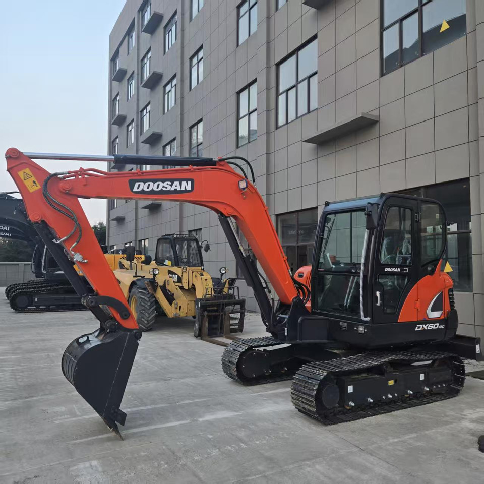 Doosan DX60 - Minikuormaaja: kuva Doosan DX60 - Minikuormaaja Doosan DX60 - Minikuormaaja: kuva Doosan DX60 - Minikuormaaja