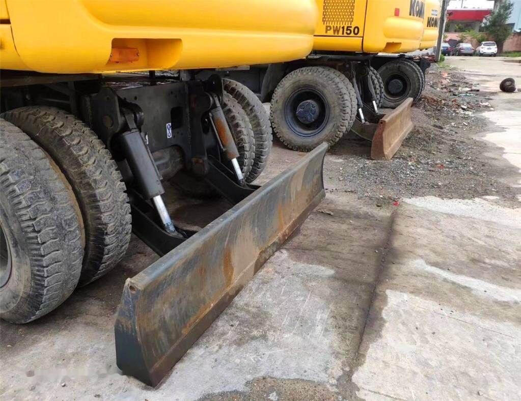 Komatsu PW150 - Pyöräalustainen kaivinkone: kuva Komatsu PW150 - Pyöräalustainen kaivinkone Komatsu PW150 - Pyöräalustainen kaivinkone: kuva Komatsu PW150 - Pyöräalustainen kaivinkone