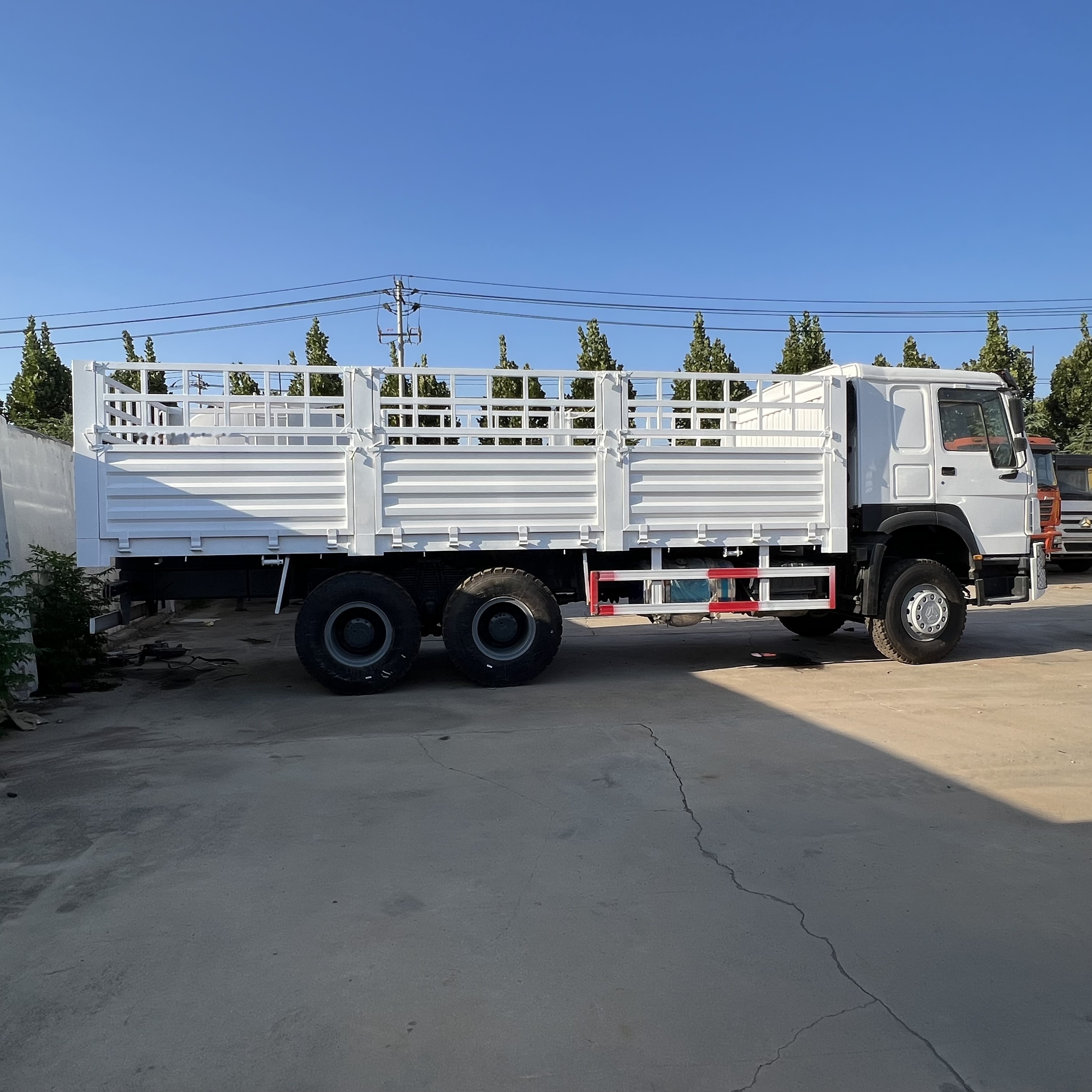 Sinotruk HOWO 371 6*4 Fence Truck - Lava-kuorma-auto: kuva Sinotruk HOWO 371 6*4 Fence Truck - Lava-kuorma-auto Sinotruk HOWO 371 6*4 Fence Truck - Lava-kuorma-auto: kuva Sinotruk HOWO 371 6*4 Fence Truck - Lava-kuorma-auto