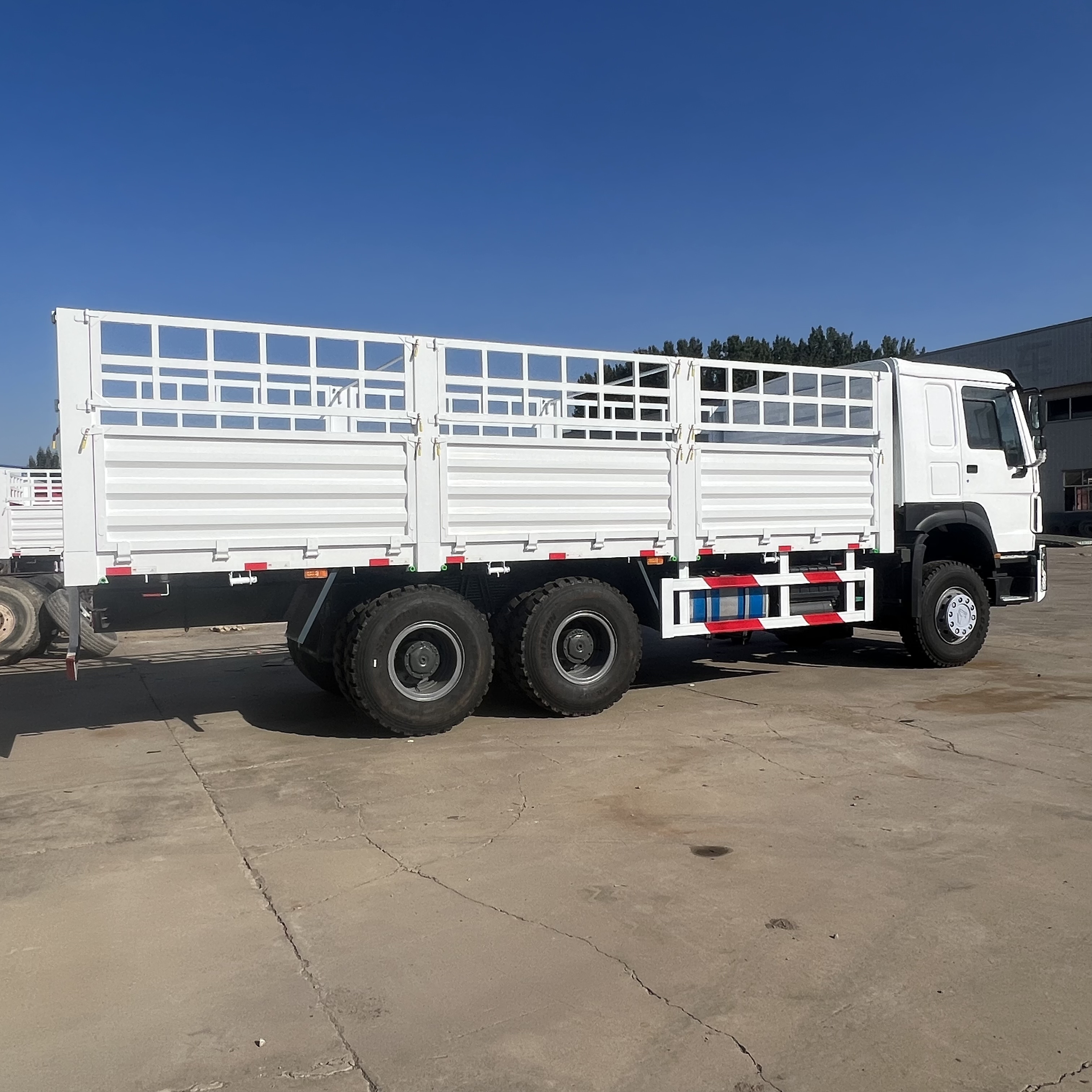 Sinotruk HOWO 371 6*4 Fence truck - Lava-kuorma-auto: kuva Sinotruk HOWO 371 6*4 Fence truck - Lava-kuorma-auto Sinotruk HOWO 371 6*4 Fence truck - Lava-kuorma-auto: kuva Sinotruk HOWO 371 6*4 Fence truck - Lava-kuorma-auto