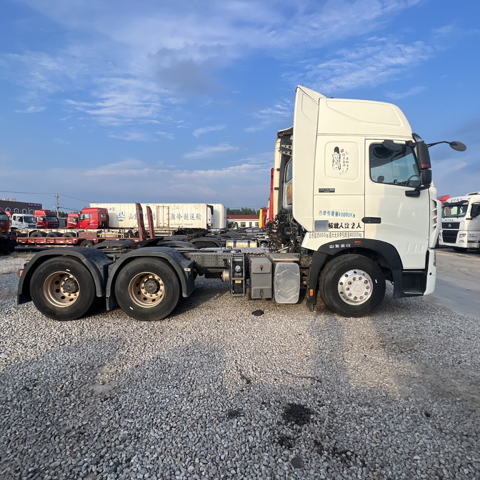 Sinotruk HOWO T7H480 Tractor - Pikku dumpperi: kuva Sinotruk HOWO T7H480 Tractor - Pikku dumpperi Sinotruk HOWO T7H480 Tractor - Pikku dumpperi: kuva Sinotruk HOWO T7H480 Tractor - Pikku dumpperi