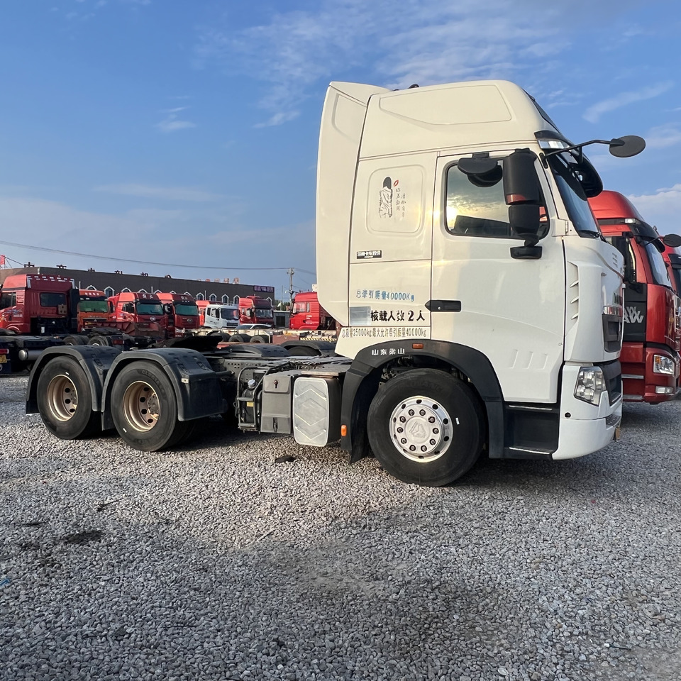 Sinotruk HOWO T7H480 Tractor - Pikku dumpperi: kuva Sinotruk HOWO T7H480 Tractor - Pikku dumpperi Sinotruk HOWO T7H480 Tractor - Pikku dumpperi: kuva Sinotruk HOWO T7H480 Tractor - Pikku dumpperi