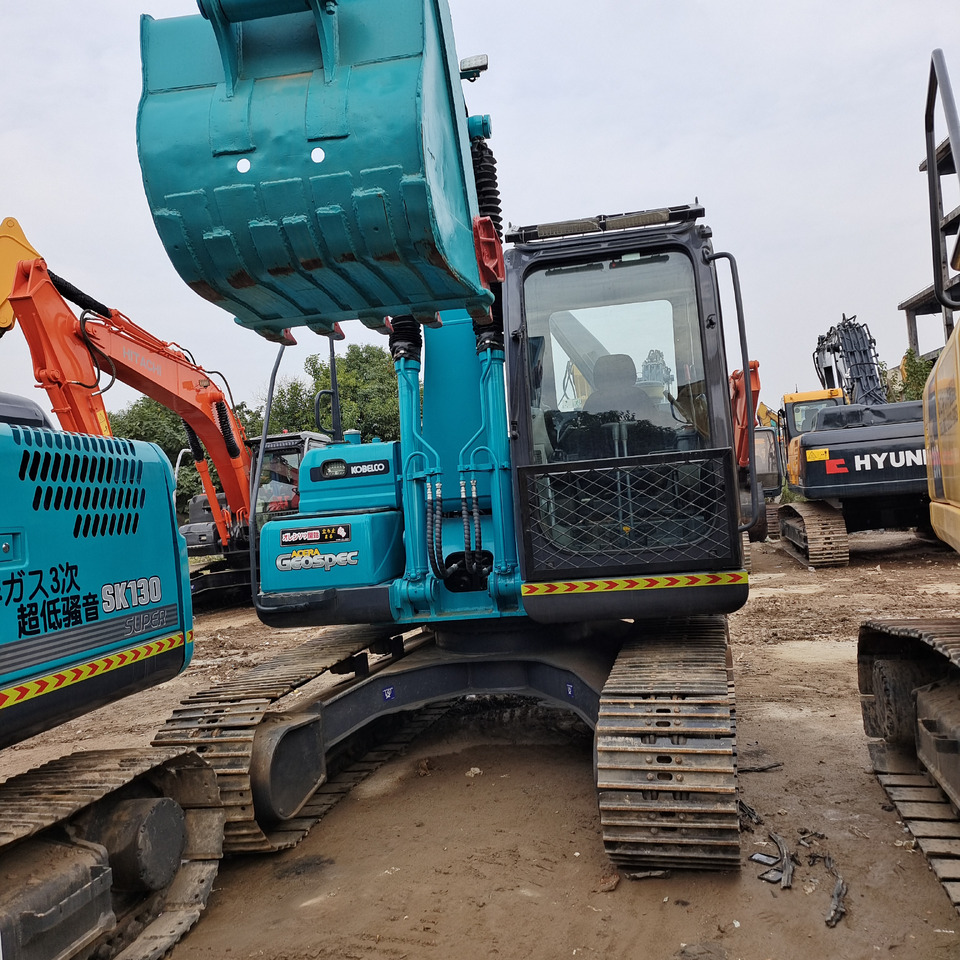 KOBELCO SK140 - Telakaivukone: kuva KOBELCO SK140 - Telakaivukone KOBELCO SK140 - Telakaivukone: kuva KOBELCO SK140 - Telakaivukone