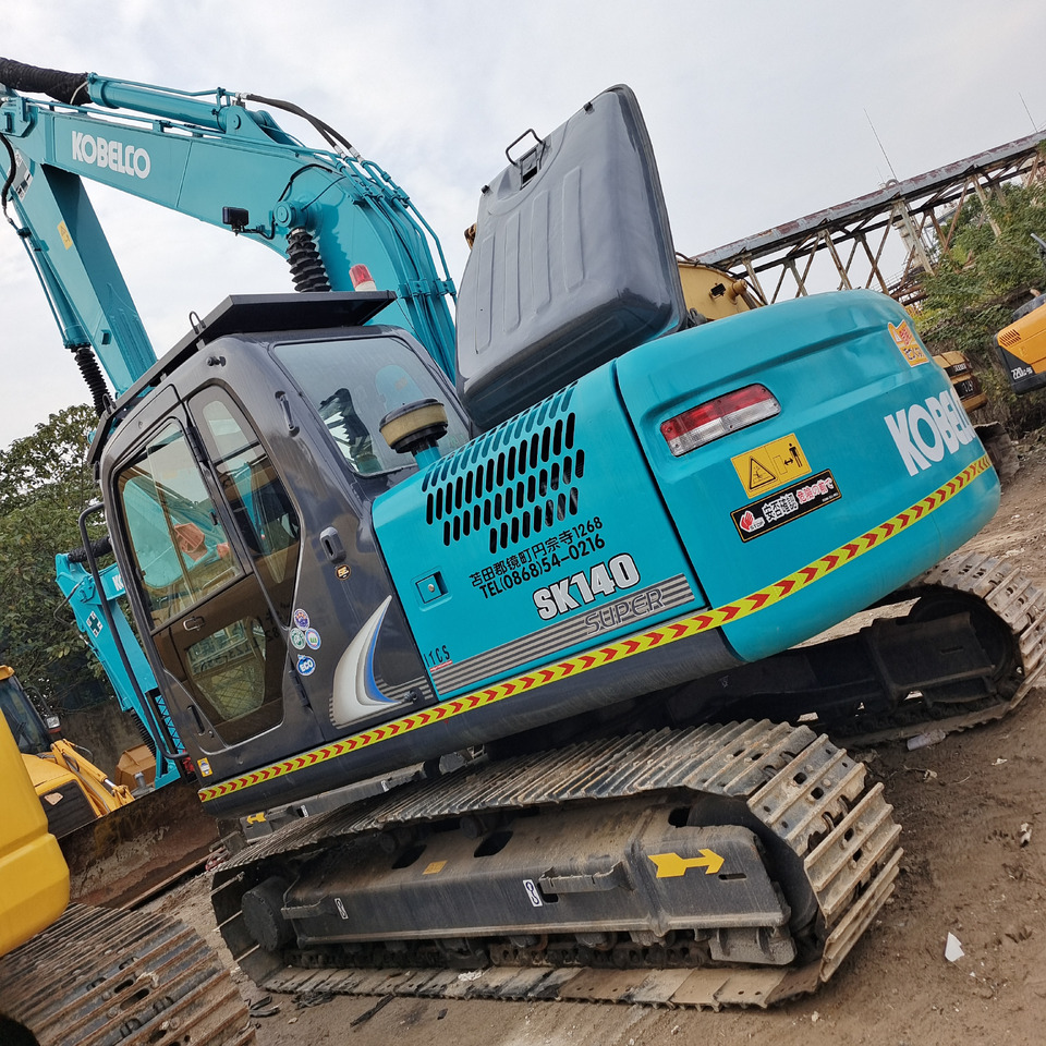 KOBELCO SK140 - Telakaivukone: kuva KOBELCO SK140 - Telakaivukone KOBELCO SK140 - Telakaivukone: kuva KOBELCO SK140 - Telakaivukone