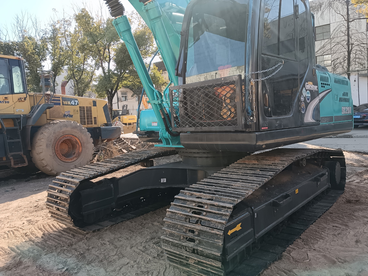 KOBELCO SK200-8 - Telakaivukone: kuva KOBELCO SK200-8 - Telakaivukone KOBELCO SK200-8 - Telakaivukone: kuva KOBELCO SK200-8 - Telakaivukone