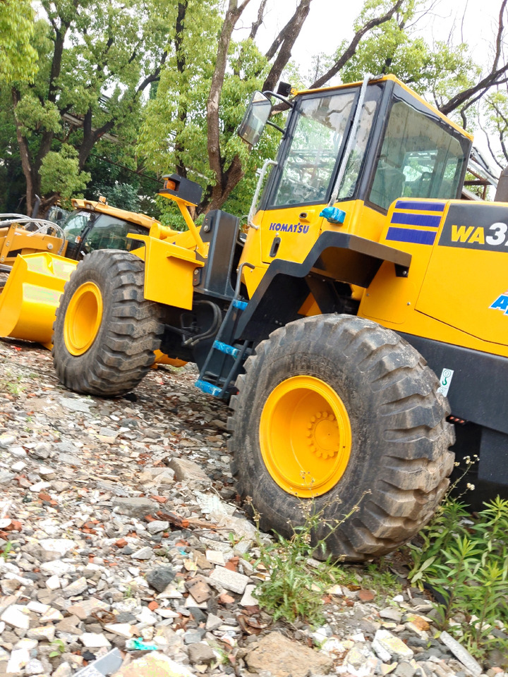 KOMATSU WA320-5 WA 320 - Pyöräkuormaaja: kuva KOMATSU WA320-5 WA 320 - Pyöräkuormaaja KOMATSU WA320-5 WA 320 - Pyöräkuormaaja: kuva KOMATSU WA320-5 WA 320 - Pyöräkuormaaja
