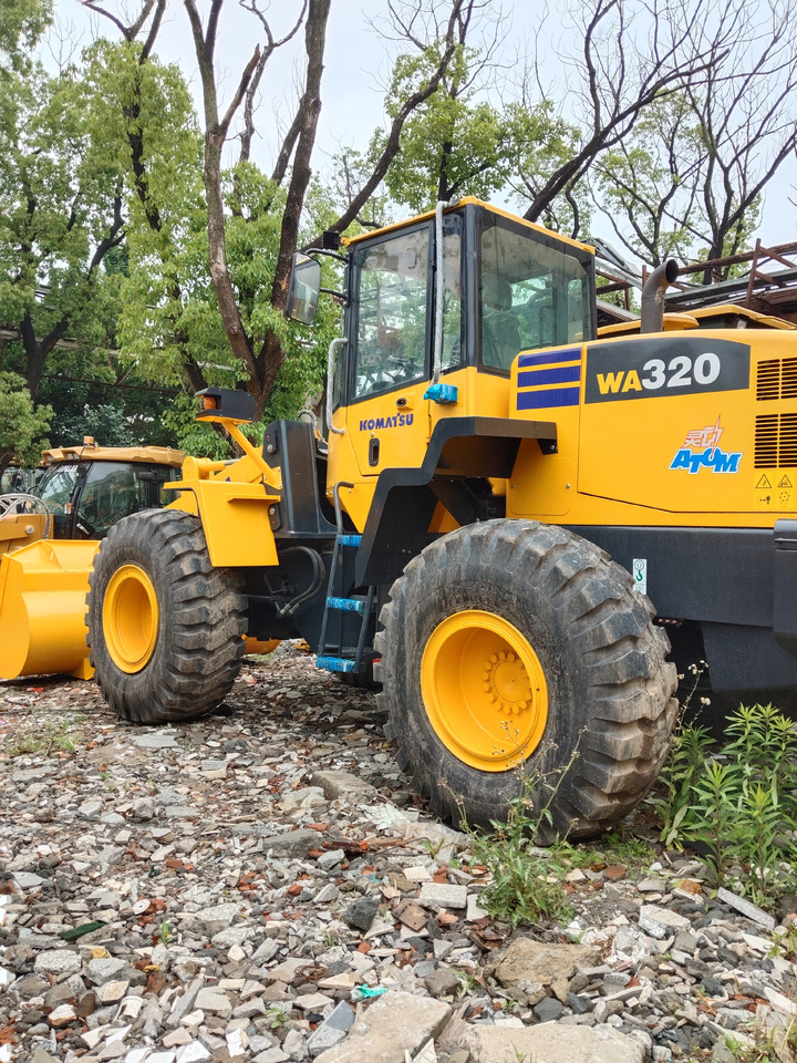 KOMATSU WA320-5 WA 320 - Pyöräkuormaaja: kuva KOMATSU WA320-5 WA 320 - Pyöräkuormaaja KOMATSU WA320-5 WA 320 - Pyöräkuormaaja: kuva KOMATSU WA320-5 WA 320 - Pyöräkuormaaja