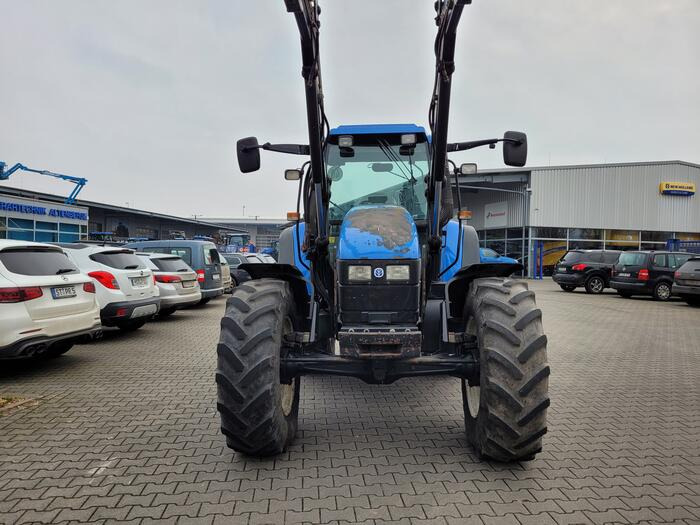 New Holland TS 115 - Traktori: kuva New Holland TS 115 - Traktori New Holland TS 115 - Traktori: kuva New Holland TS 115 - Traktori