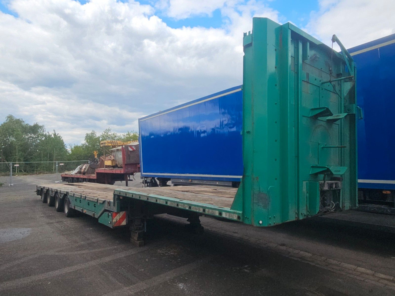 Meusburger MPG-4 Tieflader mit Radmulden 39.5t - Apuvaunu puoliperävaunu: kuva Meusburger MPG-4 Tieflader mit Radmulden 39.5t - Apuvaunu puoliperävaunu Meusburger MPG-4 Tieflader mit Radmulden 39.5t - Apuvaunu puoliperävaunu: kuva Meusburger MPG-4 Tieflader mit Radmulden 39.5t - Apuvaunu puoliperävaunu