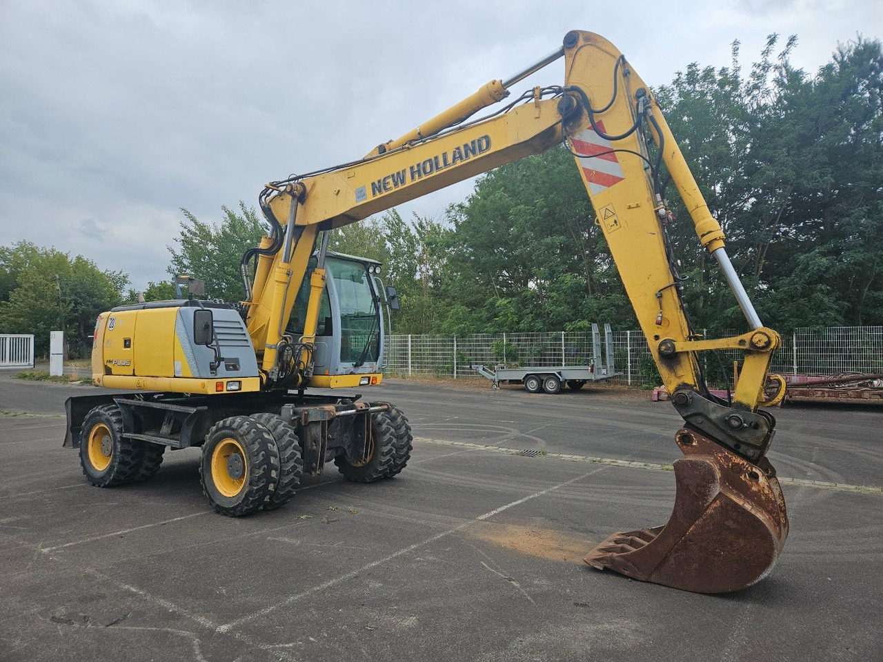 New Holland MH Plus 18t Mobilbagger - Pyöräalustainen kaivinkone: kuva New Holland MH Plus 18t Mobilbagger - Pyöräalustainen kaivinkone New Holland MH Plus 18t Mobilbagger - Pyöräalustainen kaivinkone: kuva New Holland MH Plus 18t Mobilbagger - Pyöräalustainen kaivinkone