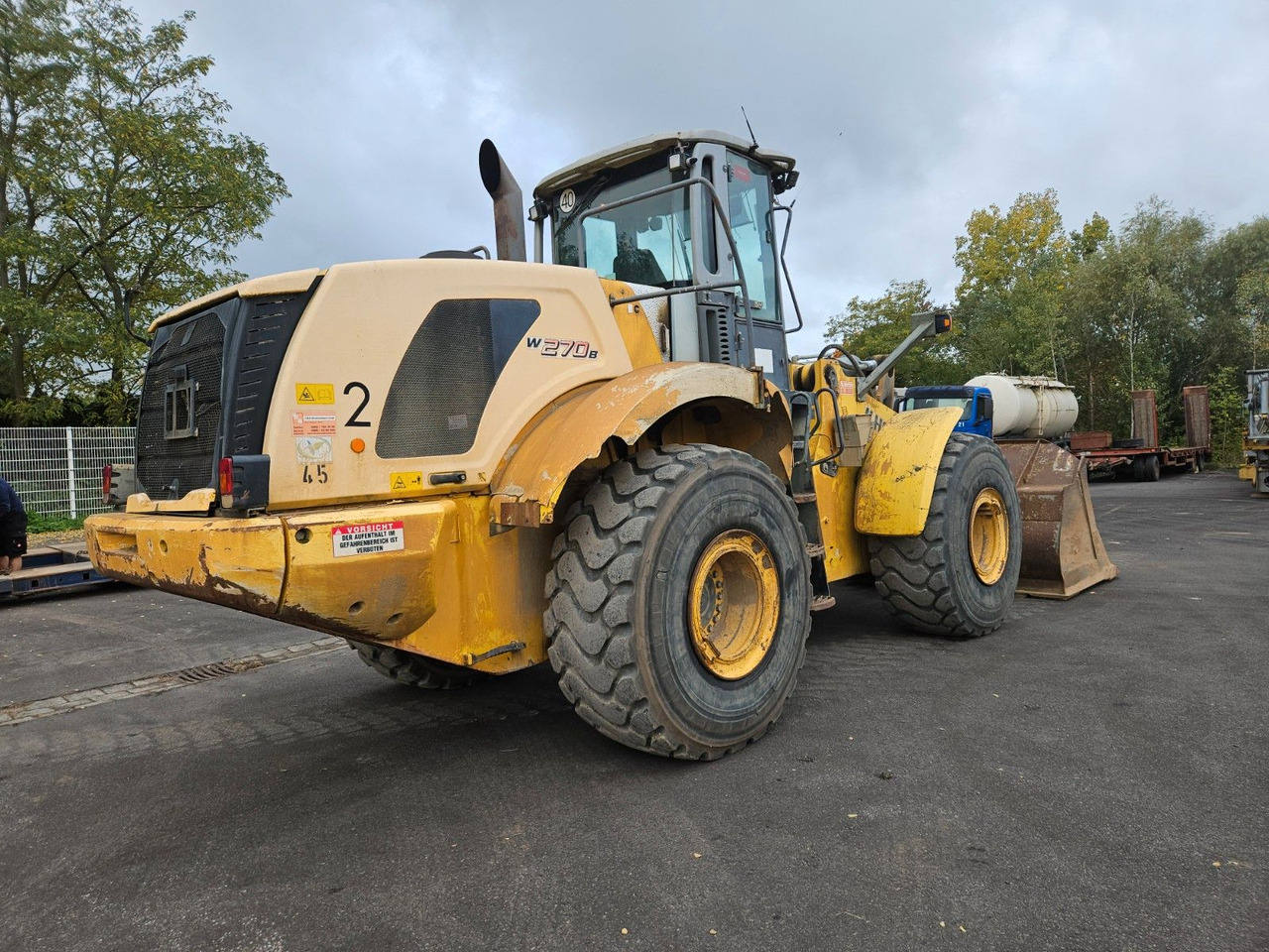 New Holland W270 B Radlader - Pyöräkuormaaja: kuva New Holland W270 B Radlader - Pyöräkuormaaja New Holland W270 B Radlader - Pyöräkuormaaja: kuva New Holland W270 B Radlader - Pyöräkuormaaja