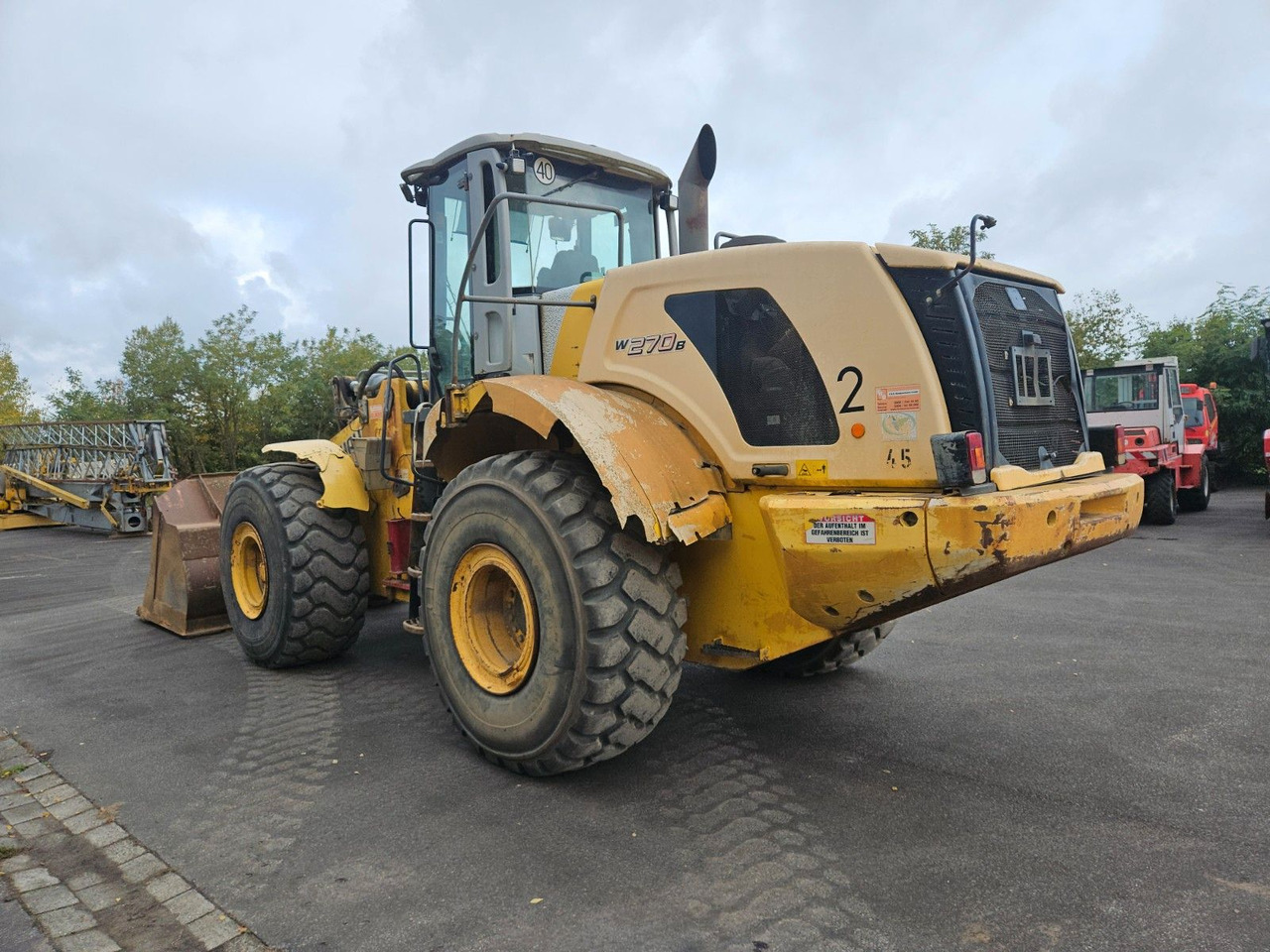 New Holland W270 B Radlader - Pyöräkuormaaja: kuva New Holland W270 B Radlader - Pyöräkuormaaja New Holland W270 B Radlader - Pyöräkuormaaja: kuva New Holland W270 B Radlader - Pyöräkuormaaja