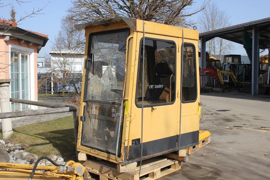 Caterpillar 206 BFT - Ohjaamo - Rakennuskoneet: kuva Caterpillar 206 BFT - Ohjaamo - Rakennuskoneet Caterpillar 206 BFT - Ohjaamo - Rakennuskoneet: kuva Caterpillar 206 BFT - Ohjaamo - Rakennuskoneet