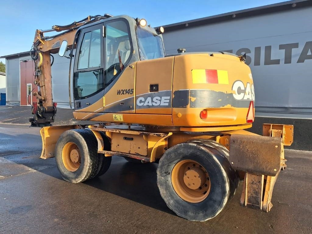 Case WX145 PYÖRITTÄJÄLLÄ - Pyöräalustainen kaivinkone: kuva Case WX145 PYÖRITTÄJÄLLÄ - Pyöräalustainen kaivinkone Case WX145 PYÖRITTÄJÄLLÄ - Pyöräalustainen kaivinkone: kuva Case WX145 PYÖRITTÄJÄLLÄ - Pyöräalustainen kaivinkone