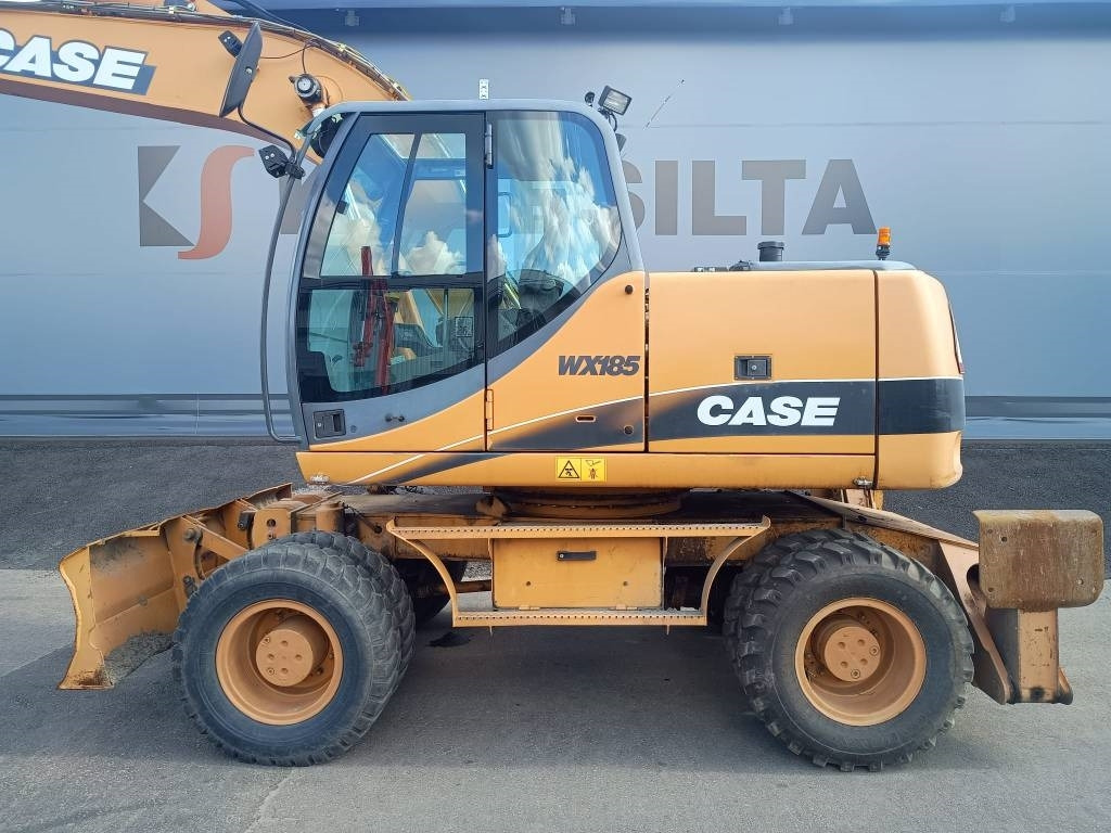 Case WX185 KALLISTAJA+PYÖRITTÄJÄ - Pyöräalustainen kaivinkone: kuva Case WX185 KALLISTAJA+PYÖRITTÄJÄ - Pyöräalustainen kaivinkone Case WX185 KALLISTAJA+PYÖRITTÄJÄ - Pyöräalustainen kaivinkone: kuva Case WX185 KALLISTAJA+PYÖRITTÄJÄ - Pyöräalustainen kaivinkone