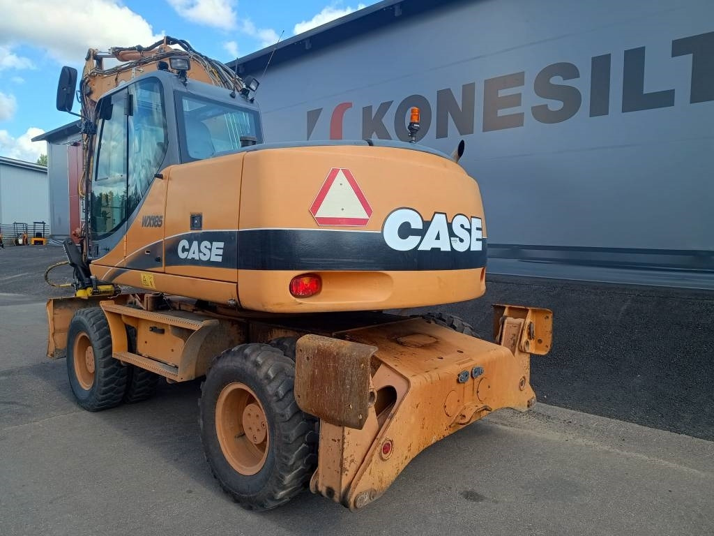 Case WX185 KALLISTAJA+PYÖRITTÄJÄ - Pyöräalustainen kaivinkone: kuva Case WX185 KALLISTAJA+PYÖRITTÄJÄ - Pyöräalustainen kaivinkone Case WX185 KALLISTAJA+PYÖRITTÄJÄ - Pyöräalustainen kaivinkone: kuva Case WX185 KALLISTAJA+PYÖRITTÄJÄ - Pyöräalustainen kaivinkone
