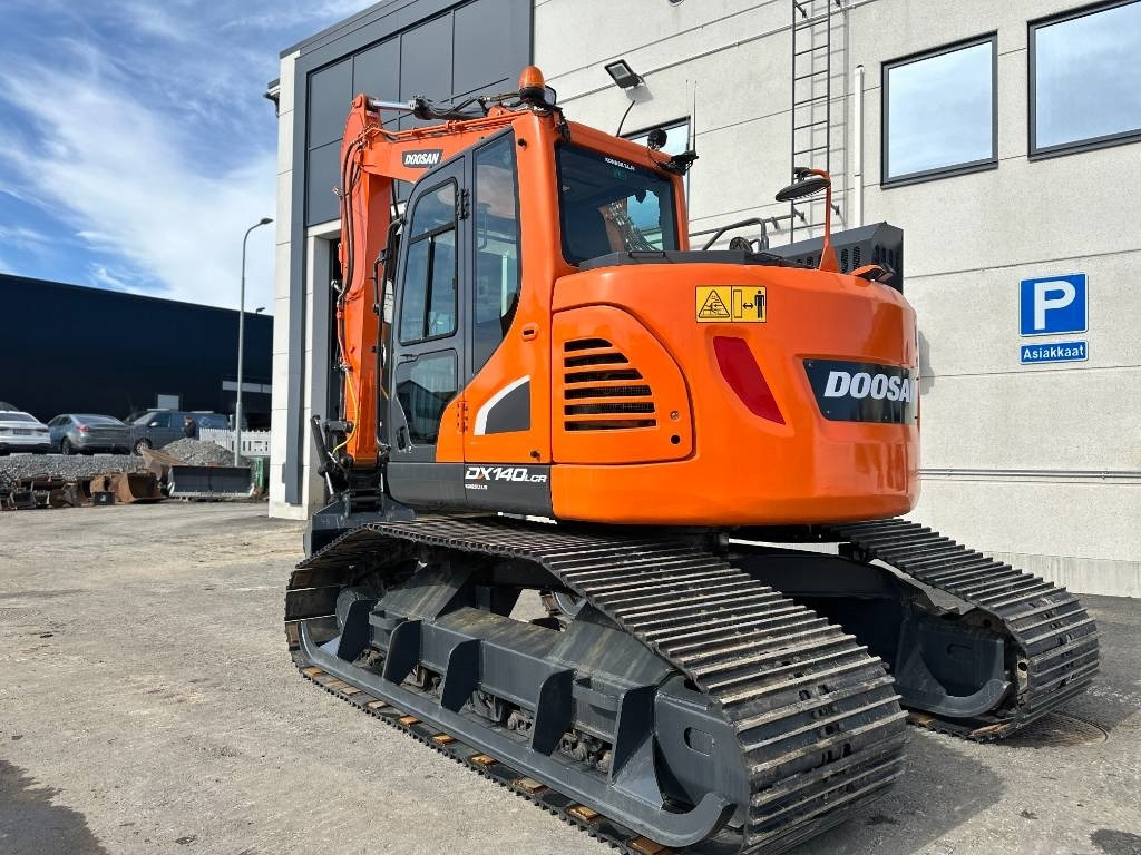 Doosan DX 140 LCR-5 metsäalusta - Telakaivukone: kuva Doosan DX 140 LCR-5 metsäalusta - Telakaivukone Doosan DX 140 LCR-5 metsäalusta - Telakaivukone: kuva Doosan DX 140 LCR-5 metsäalusta - Telakaivukone