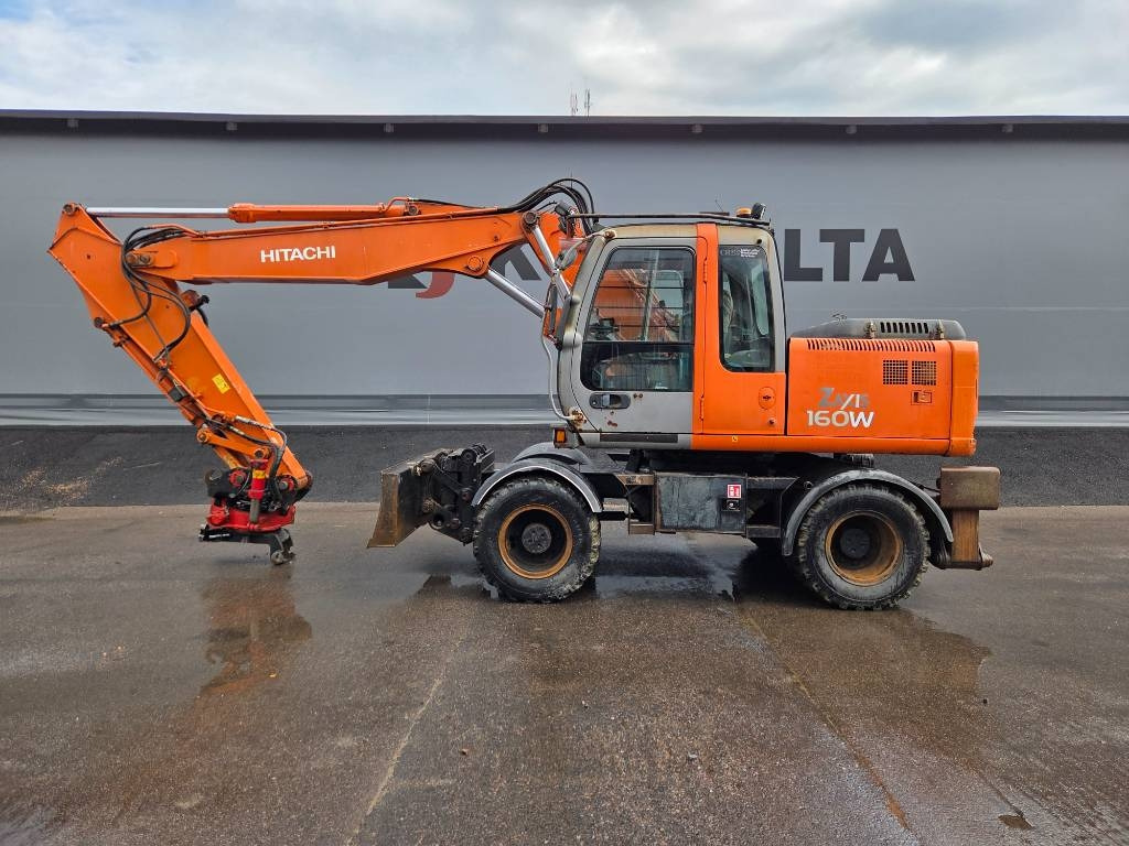 Hitachi ZX160 W PYÖRITTÄJÄLLÄ - Pyöräalustainen kaivinkone: kuva Hitachi ZX160 W PYÖRITTÄJÄLLÄ - Pyöräalustainen kaivinkone Hitachi ZX160 W PYÖRITTÄJÄLLÄ - Pyöräalustainen kaivinkone: kuva Hitachi ZX160 W PYÖRITTÄJÄLLÄ - Pyöräalustainen kaivinkone