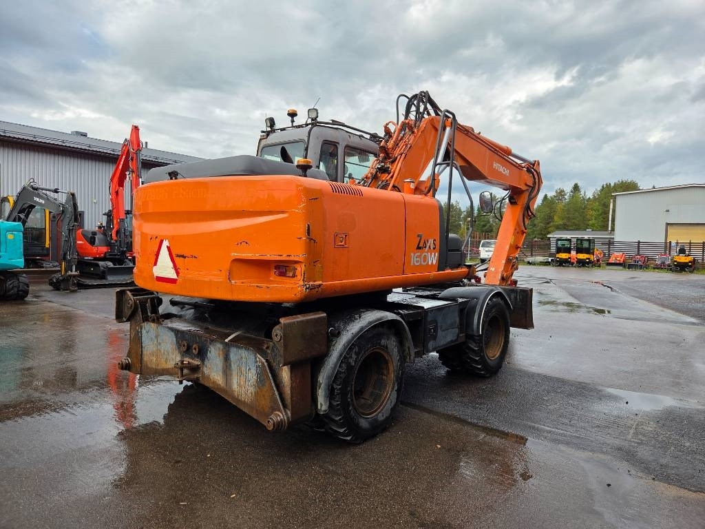 Hitachi ZX160 W PYÖRITTÄJÄLLÄ - Pyöräalustainen kaivinkone: kuva Hitachi ZX160 W PYÖRITTÄJÄLLÄ - Pyöräalustainen kaivinkone Hitachi ZX160 W PYÖRITTÄJÄLLÄ - Pyöräalustainen kaivinkone: kuva Hitachi ZX160 W PYÖRITTÄJÄLLÄ - Pyöräalustainen kaivinkone