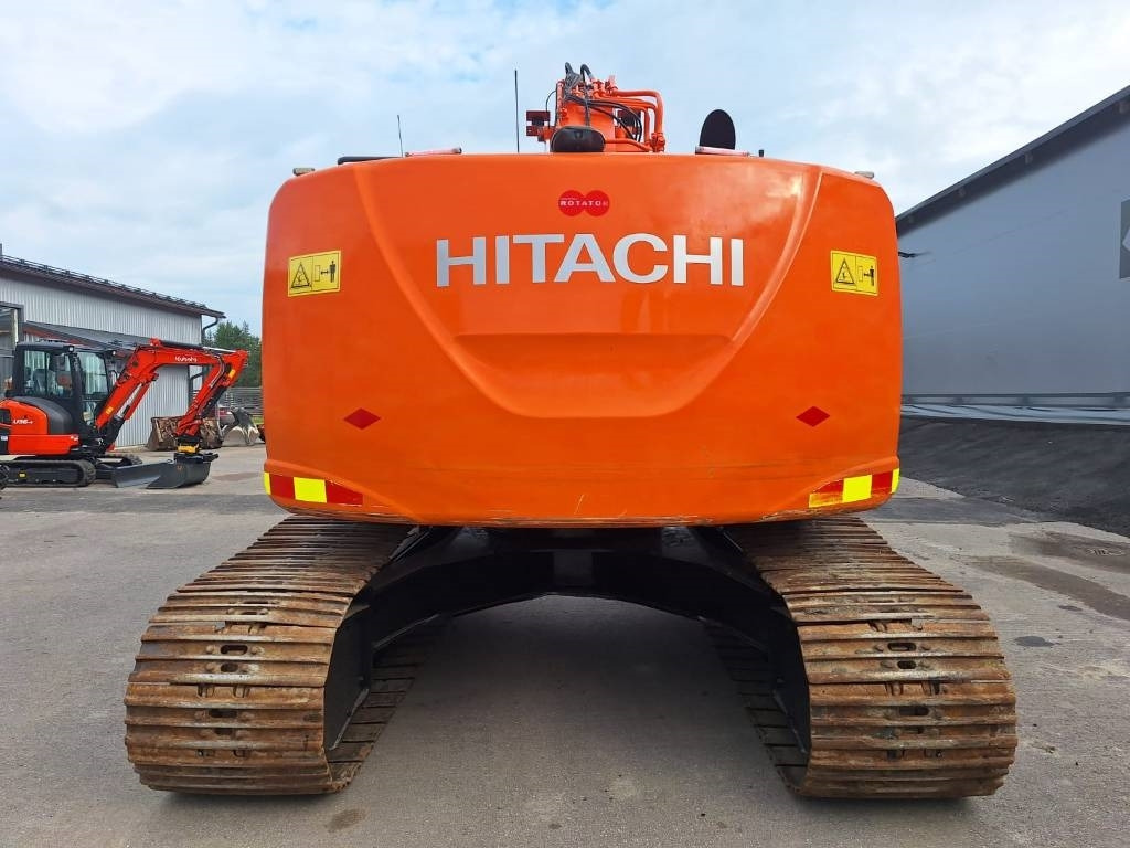 Hitachi ZX225USLC-5 PYÖRITTÄJÄLLÄ - Telakaivukone: kuva Hitachi ZX225USLC-5 PYÖRITTÄJÄLLÄ - Telakaivukone Hitachi ZX225USLC-5 PYÖRITTÄJÄLLÄ - Telakaivukone: kuva Hitachi ZX225USLC-5 PYÖRITTÄJÄLLÄ - Telakaivukone