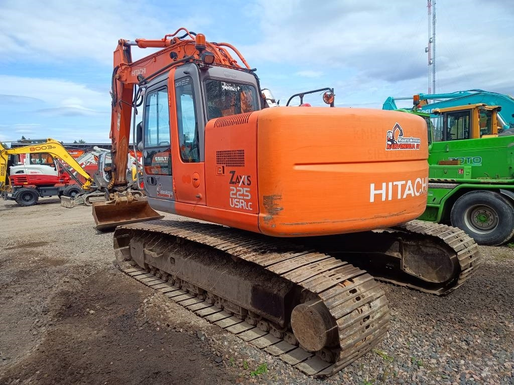 Hitachi ZX225USR KALLISTAJALLA - Telakaivukone: kuva Hitachi ZX225USR KALLISTAJALLA - Telakaivukone Hitachi ZX225USR KALLISTAJALLA - Telakaivukone: kuva Hitachi ZX225USR KALLISTAJALLA - Telakaivukone