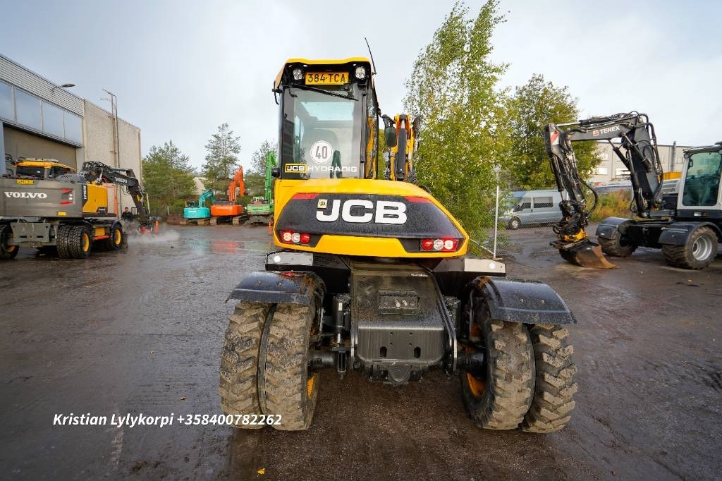 JCB 110W Hydradig PYÖRITTÄJÄLLÄ - Pyöräalustainen kaivinkone: kuva JCB 110W Hydradig PYÖRITTÄJÄLLÄ - Pyöräalustainen kaivinkone JCB 110W Hydradig PYÖRITTÄJÄLLÄ - Pyöräalustainen kaivinkone: kuva JCB 110W Hydradig PYÖRITTÄJÄLLÄ - Pyöräalustainen kaivinkone