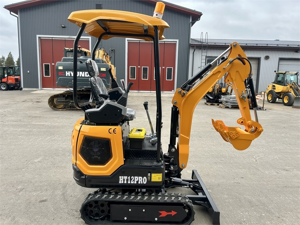 JPC HT12PRO KUIN UUSI - Minikuormaaja: kuva JPC HT12PRO KUIN UUSI - Minikuormaaja JPC HT12PRO KUIN UUSI - Minikuormaaja: kuva JPC HT12PRO KUIN UUSI - Minikuormaaja