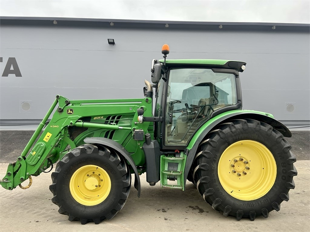 John Deere 6125 R AUTOPOWER ETUKUORMAAJALLA - Traktori: kuva John Deere 6125 R AUTOPOWER ETUKUORMAAJALLA - Traktori John Deere 6125 R AUTOPOWER ETUKUORMAAJALLA - Traktori: kuva John Deere 6125 R AUTOPOWER ETUKUORMAAJALLA - Traktori