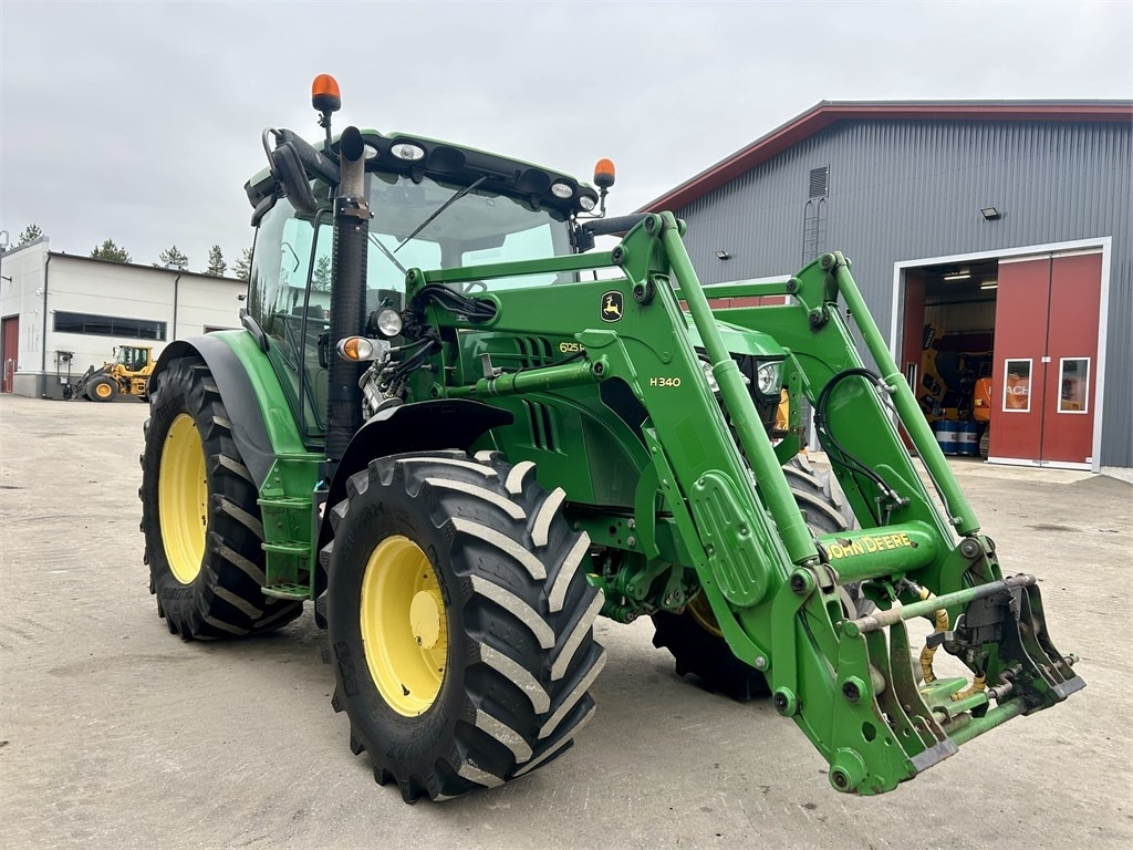 John Deere 6125 R AUTOPOWER ETUKUORMAAJALLA - Traktori: kuva John Deere 6125 R AUTOPOWER ETUKUORMAAJALLA - Traktori John Deere 6125 R AUTOPOWER ETUKUORMAAJALLA - Traktori: kuva John Deere 6125 R AUTOPOWER ETUKUORMAAJALLA - Traktori