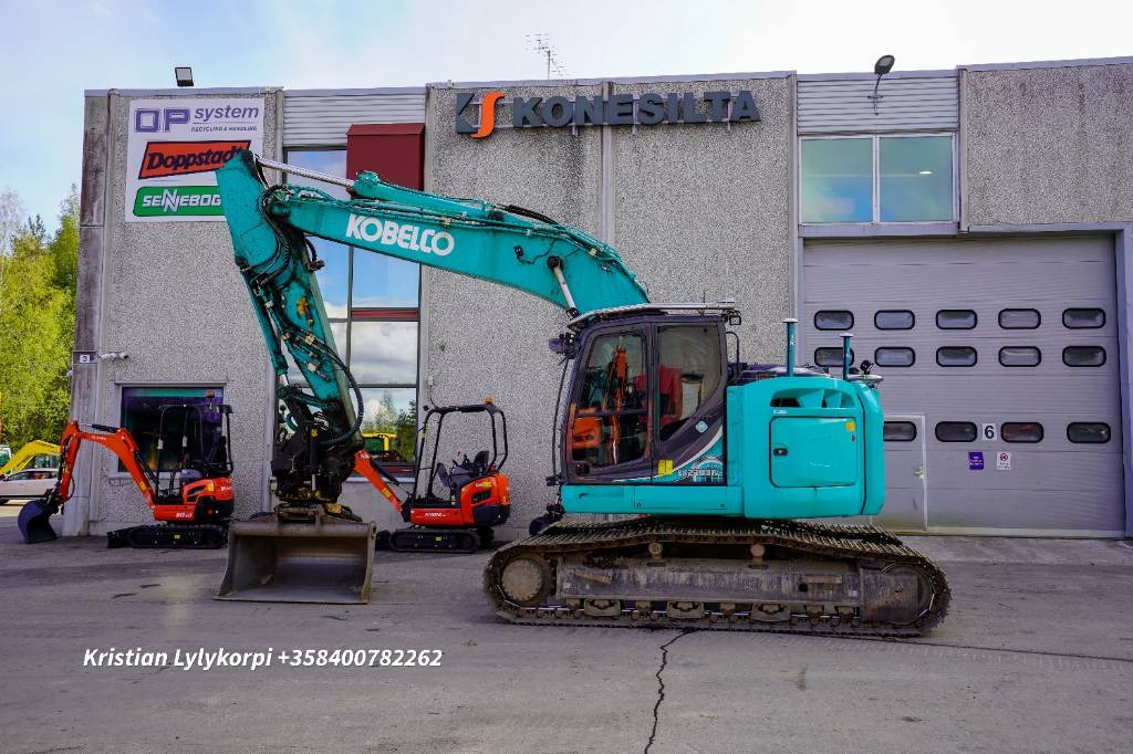 Kobelco SK230SRLC-5E STAGE V - Telakaivukone: kuva Kobelco SK230SRLC-5E STAGE V - Telakaivukone Kobelco SK230SRLC-5E STAGE V - Telakaivukone: kuva Kobelco SK230SRLC-5E STAGE V - Telakaivukone