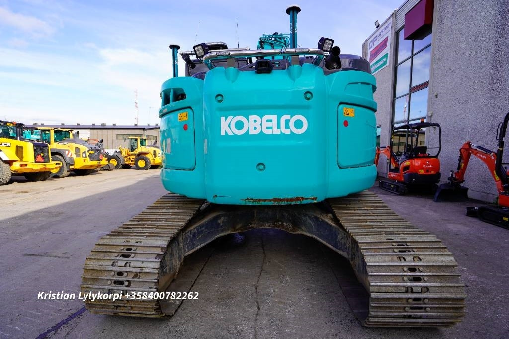 Kobelco SK230SRLC-5E STAGE V - Telakaivukone: kuva Kobelco SK230SRLC-5E STAGE V - Telakaivukone Kobelco SK230SRLC-5E STAGE V - Telakaivukone: kuva Kobelco SK230SRLC-5E STAGE V - Telakaivukone