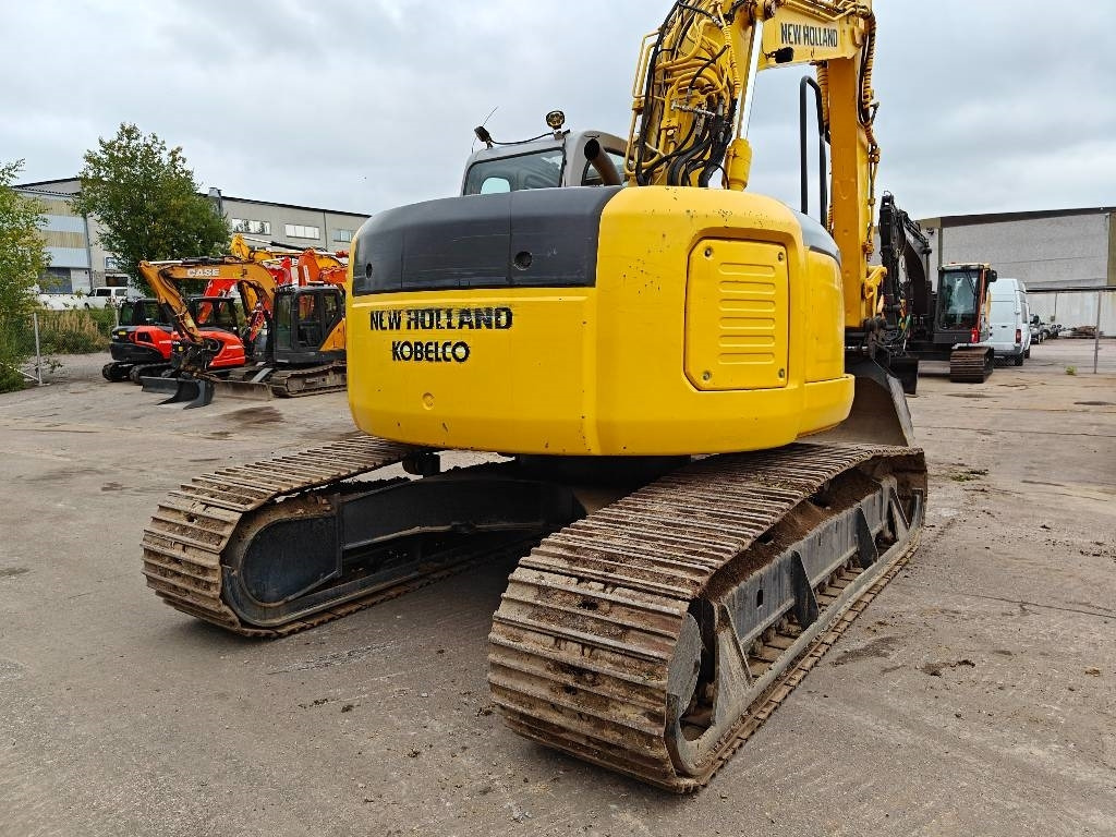 New Holland E200SRLC KALLISTUVA KAUHA - Telakaivukone: kuva New Holland E200SRLC KALLISTUVA KAUHA - Telakaivukone New Holland E200SRLC KALLISTUVA KAUHA - Telakaivukone: kuva New Holland E200SRLC KALLISTUVA KAUHA - Telakaivukone