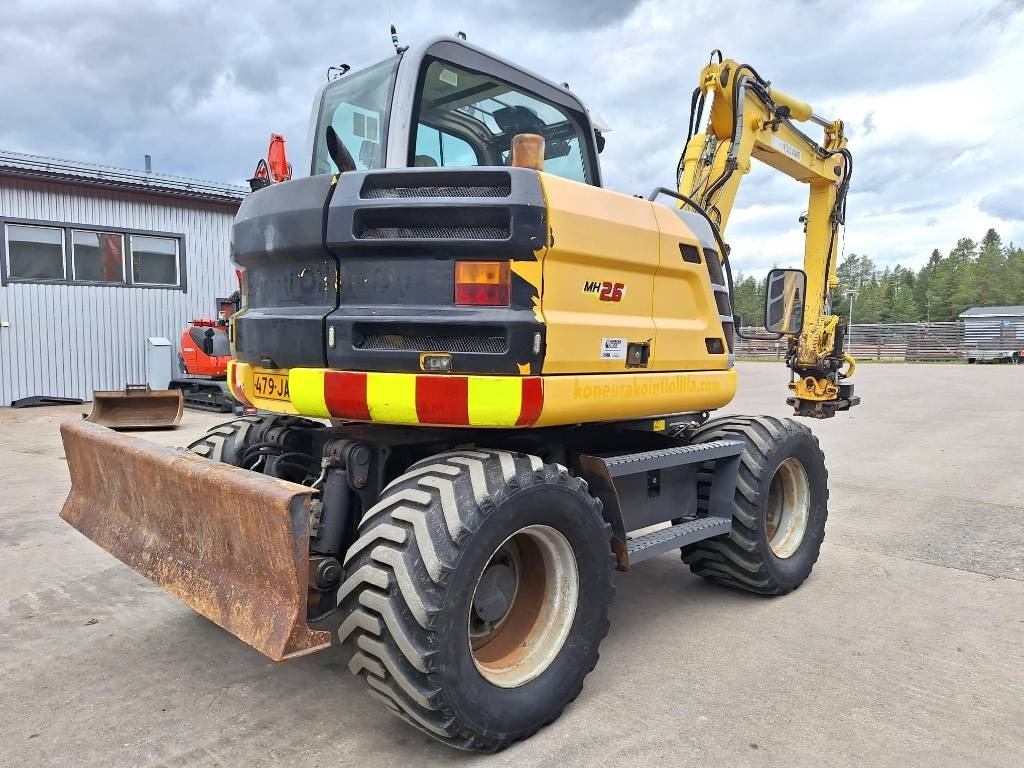 New Holland MH2.6 ENGCON PIHDEILLÄ - Pyöräalustainen kaivinkone: kuva New Holland MH2.6 ENGCON PIHDEILLÄ - Pyöräalustainen kaivinkone New Holland MH2.6 ENGCON PIHDEILLÄ - Pyöräalustainen kaivinkone: kuva New Holland MH2.6 ENGCON PIHDEILLÄ - Pyöräalustainen kaivinkone