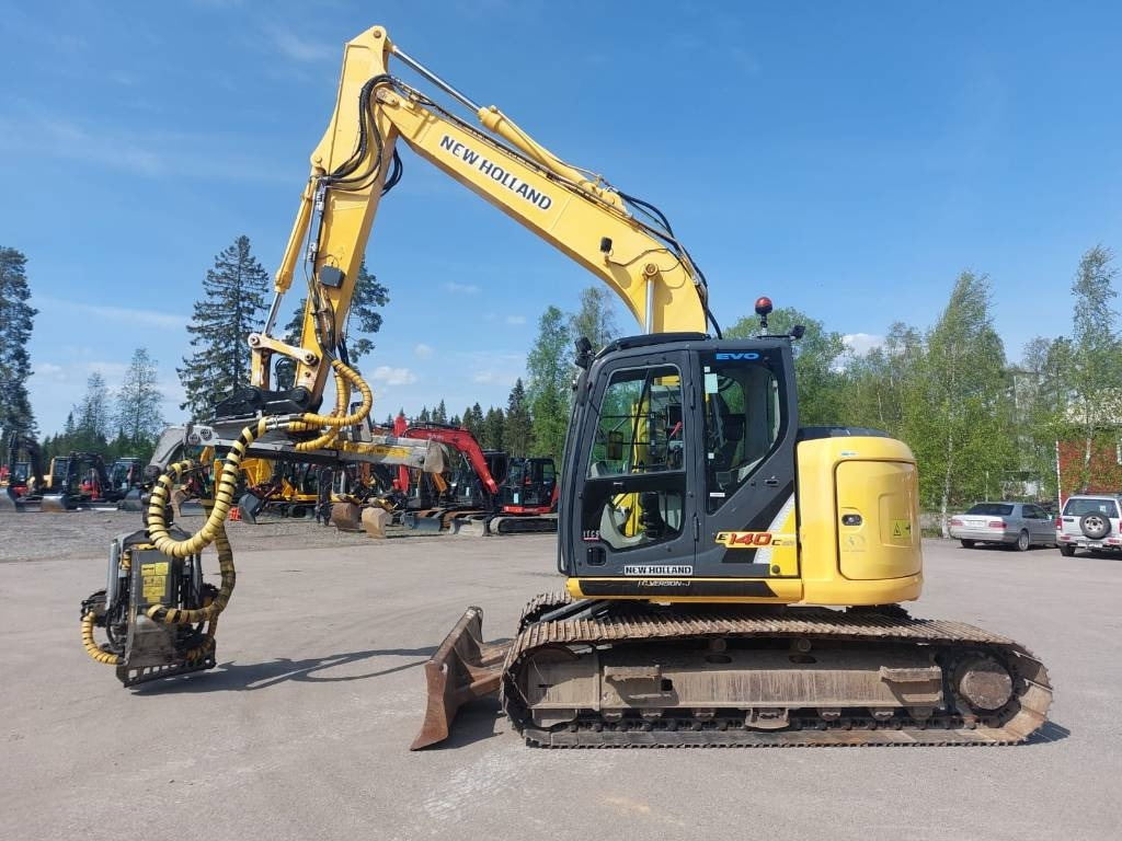 New Holland MYYTY! SOLD! E140CSR MOTO - Telakaivukone: kuva New Holland MYYTY! SOLD! E140CSR MOTO - Telakaivukone New Holland MYYTY! SOLD! E140CSR MOTO - Telakaivukone: kuva New Holland MYYTY! SOLD! E140CSR MOTO - Telakaivukone