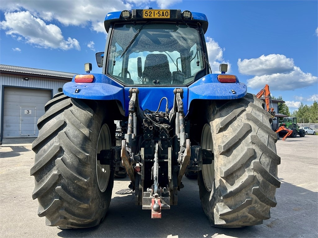 New Holland TG285 - Traktori: kuva New Holland TG285 - Traktori New Holland TG285 - Traktori: kuva New Holland TG285 - Traktori