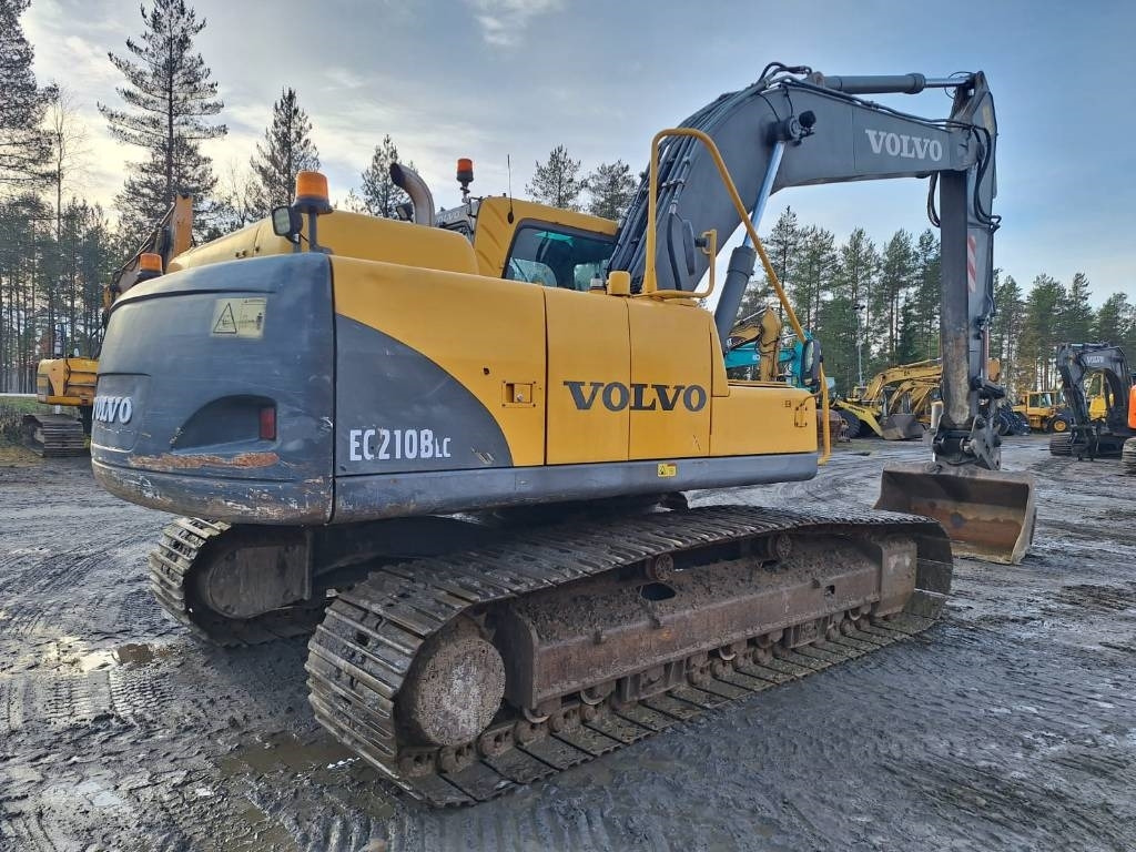 Volvo EC210BLC KALLISTUVA LUISKAKAUHA - Telakaivukone: kuva Volvo EC210BLC KALLISTUVA LUISKAKAUHA - Telakaivukone Volvo EC210BLC KALLISTUVA LUISKAKAUHA - Telakaivukone: kuva Volvo EC210BLC KALLISTUVA LUISKAKAUHA - Telakaivukone