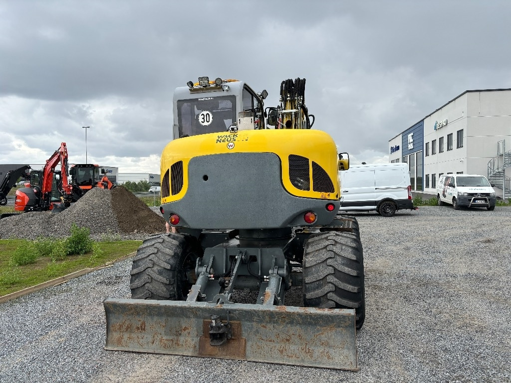 Wacker Neuson EW 100 - Pyöräalustainen kaivinkone: kuva Wacker Neuson EW 100 - Pyöräalustainen kaivinkone Wacker Neuson EW 100 - Pyöräalustainen kaivinkone: kuva Wacker Neuson EW 100 - Pyöräalustainen kaivinkone