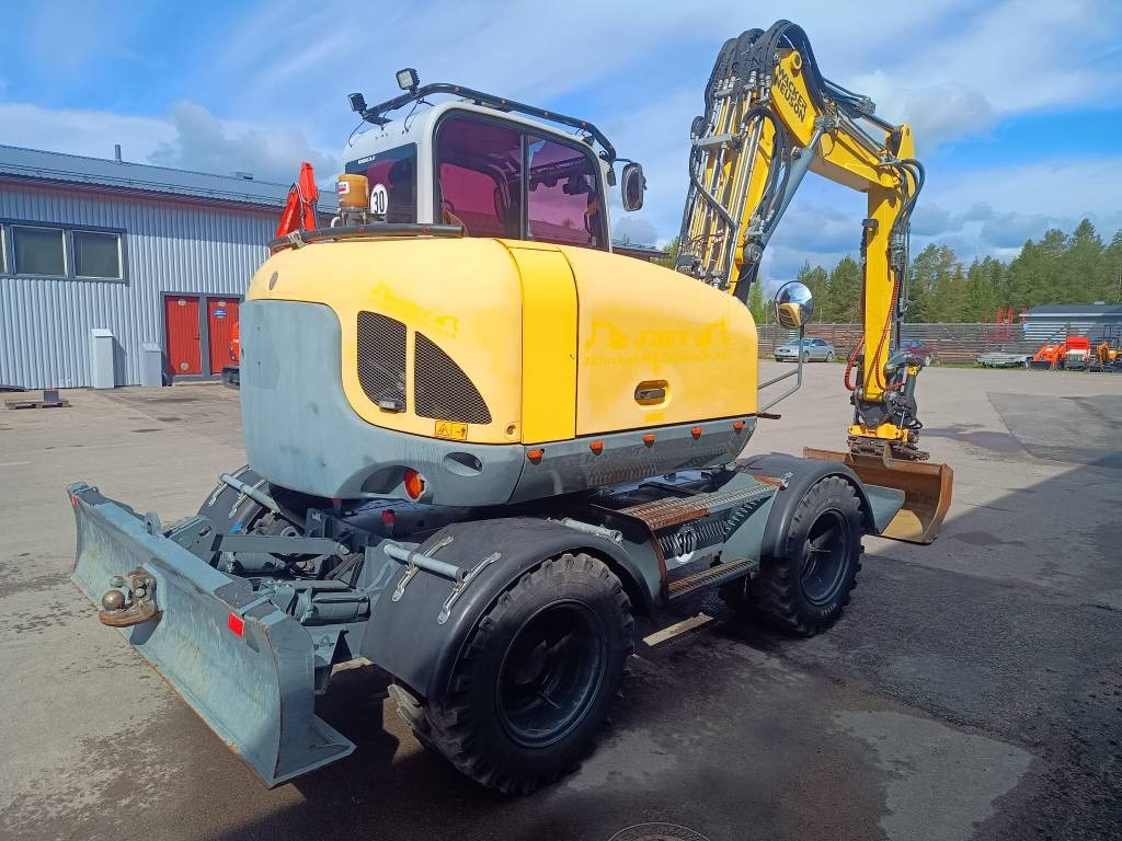 Wacker Neuson EW100 PYÖRITTÄJÄLLÄ - Pyöräalustainen kaivinkone: kuva Wacker Neuson EW100 PYÖRITTÄJÄLLÄ - Pyöräalustainen kaivinkone Wacker Neuson EW100 PYÖRITTÄJÄLLÄ - Pyöräalustainen kaivinkone: kuva Wacker Neuson EW100 PYÖRITTÄJÄLLÄ - Pyöräalustainen kaivinkone
