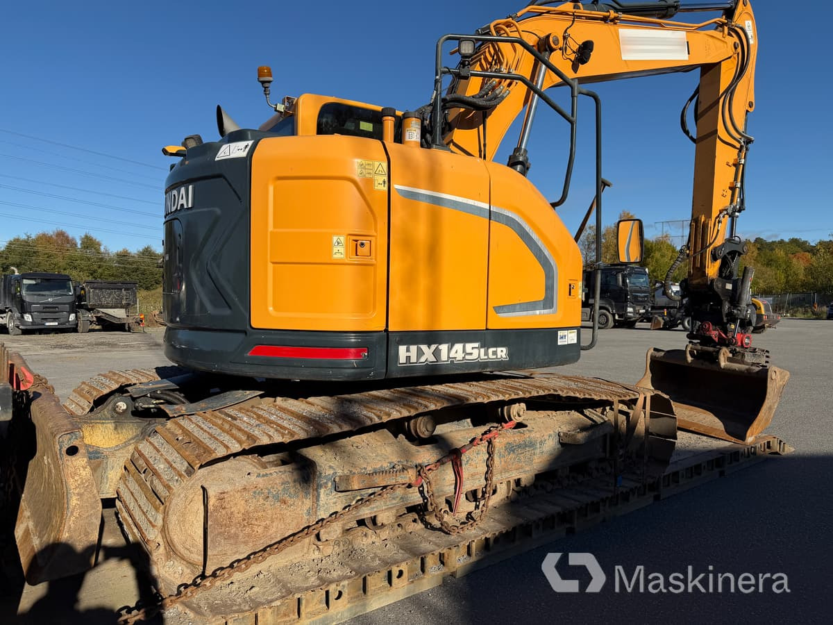 Grävmaskin Hyundai HX 145 LCR - Telakaivukone: kuva Grävmaskin Hyundai HX 145 LCR - Telakaivukone Grävmaskin Hyundai HX 145 LCR - Telakaivukone: kuva Grävmaskin Hyundai HX 145 LCR - Telakaivukone