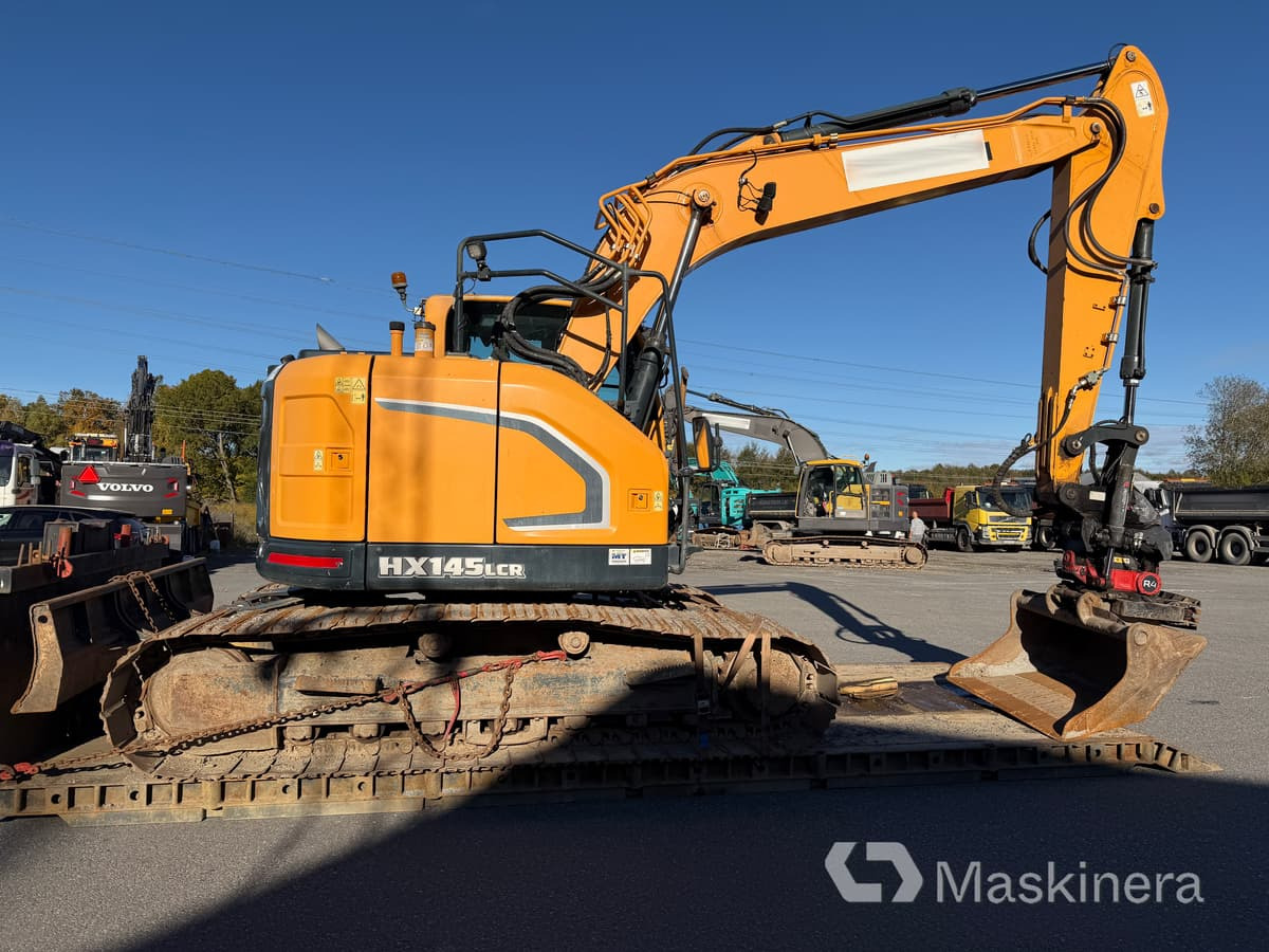 Grävmaskin Hyundai HX 145 LCR - Telakaivukone: kuva Grävmaskin Hyundai HX 145 LCR - Telakaivukone Grävmaskin Hyundai HX 145 LCR - Telakaivukone: kuva Grävmaskin Hyundai HX 145 LCR - Telakaivukone