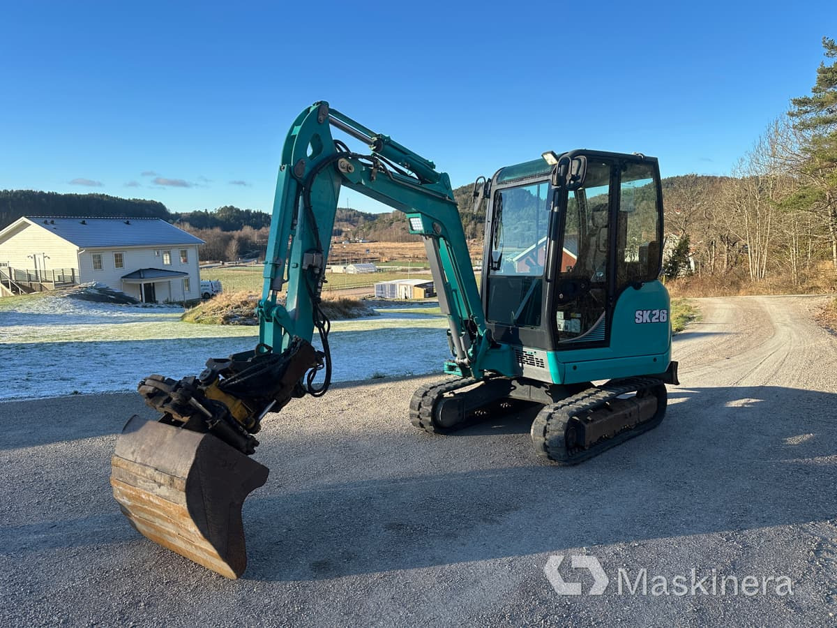 Grävmaskin Kobelco SK26 - Telakaivukone: kuva Grävmaskin Kobelco SK26 - Telakaivukone Grävmaskin Kobelco SK26 - Telakaivukone: kuva Grävmaskin Kobelco SK26 - Telakaivukone