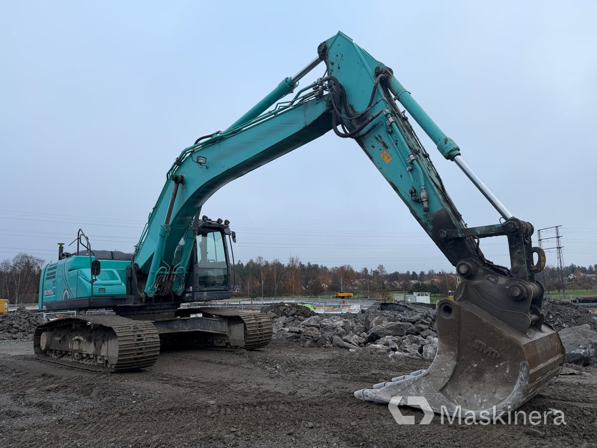 Grävmaskin Kobelco SK260LC-10 - Telakaivukone: kuva Grävmaskin Kobelco SK260LC-10 - Telakaivukone Grävmaskin Kobelco SK260LC-10 - Telakaivukone: kuva Grävmaskin Kobelco SK260LC-10 - Telakaivukone