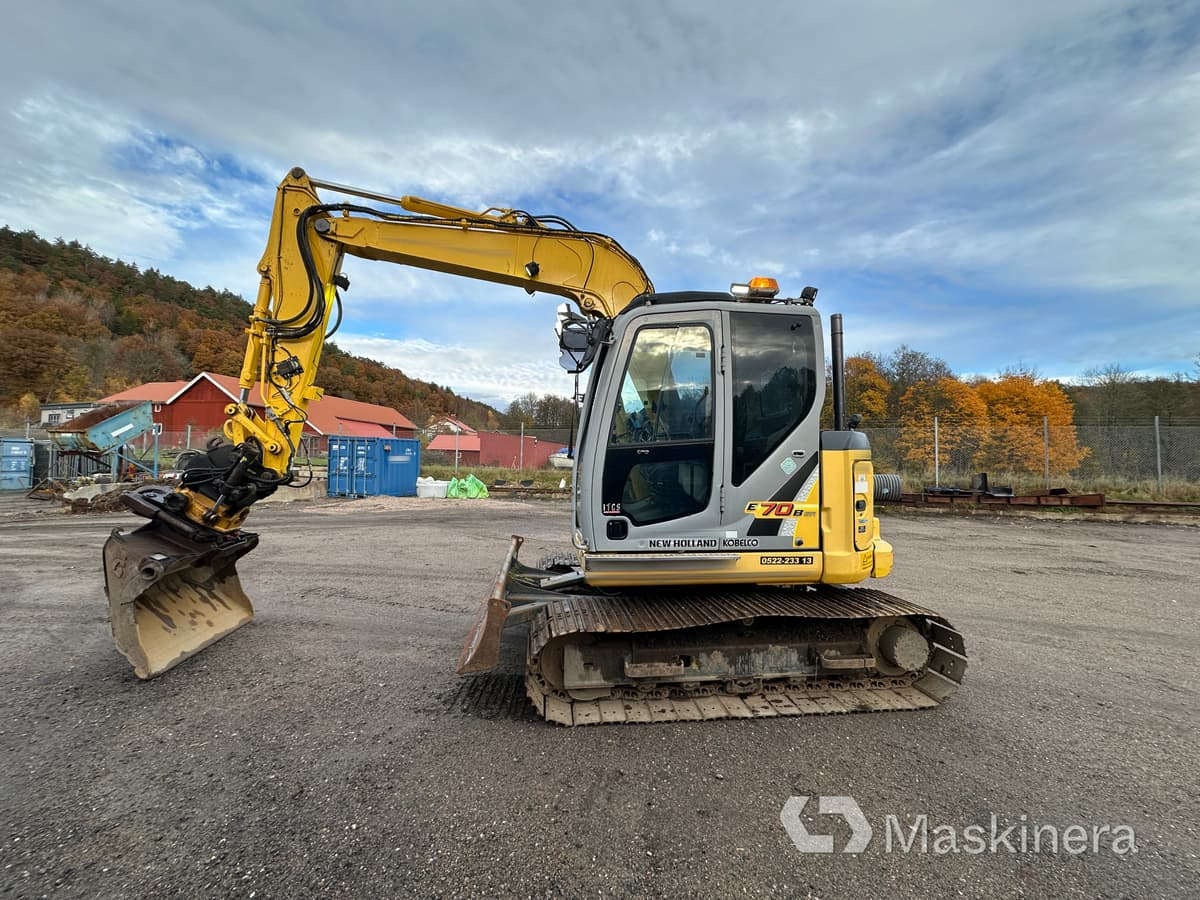 Grävmaskin New Holland Kobelco E70BSR-2 - Telakaivukone: kuva Grävmaskin New Holland Kobelco E70BSR-2 - Telakaivukone Grävmaskin New Holland Kobelco E70BSR-2 - Telakaivukone: kuva Grävmaskin New Holland Kobelco E70BSR-2 - Telakaivukone