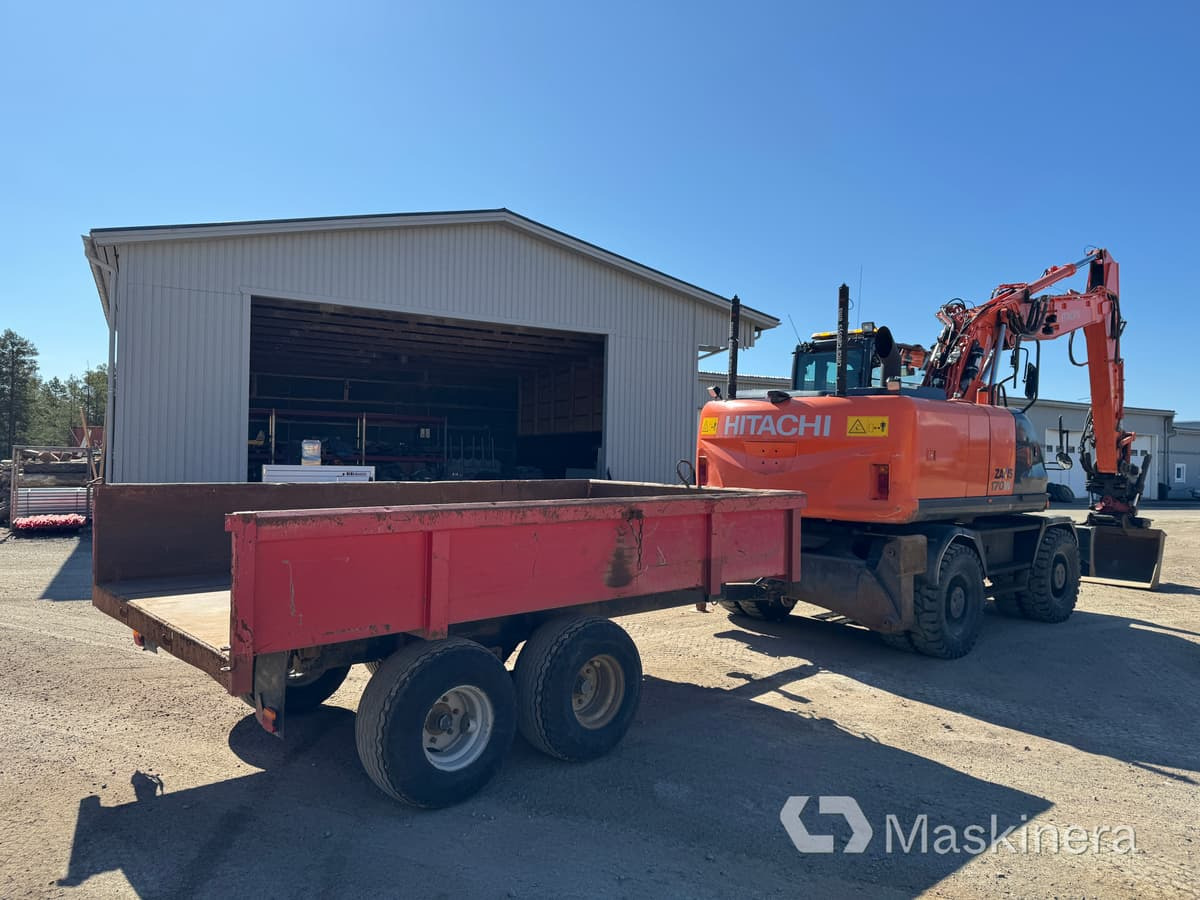 Hitachi ZX170W-5B Hjulgrävare Hitachi ZX170W med vagn - Telakaivukone: kuva Hitachi ZX170W-5B Hjulgrävare Hitachi ZX170W med vagn - Telakaivukone Hitachi ZX170W-5B Hjulgrävare Hitachi ZX170W med vagn - Telakaivukone: kuva Hitachi ZX170W-5B Hjulgrävare Hitachi ZX170W med vagn - Telakaivukone